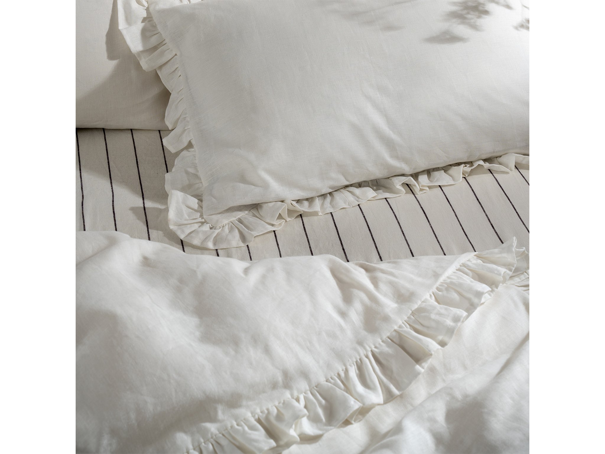Best linen bedding Indybest review Soak & Sleep white ruffled French linen duvet cover