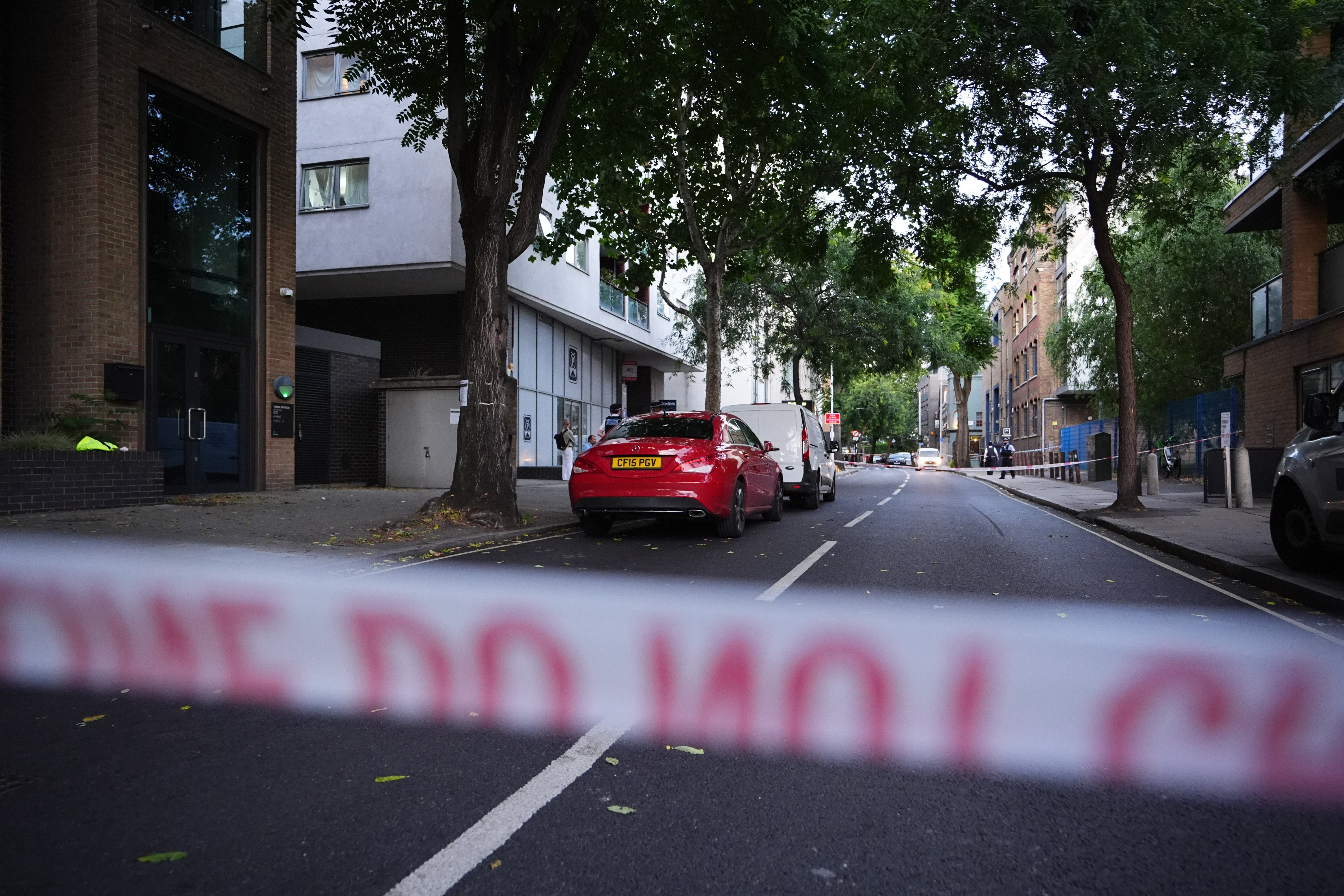 Police tape pictured at Long Lane in Southwark