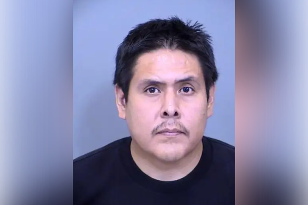 Ascencio Largo is accused of leaving his four children, all under the age of 10, inside a hot car in Phoenix, Arizona