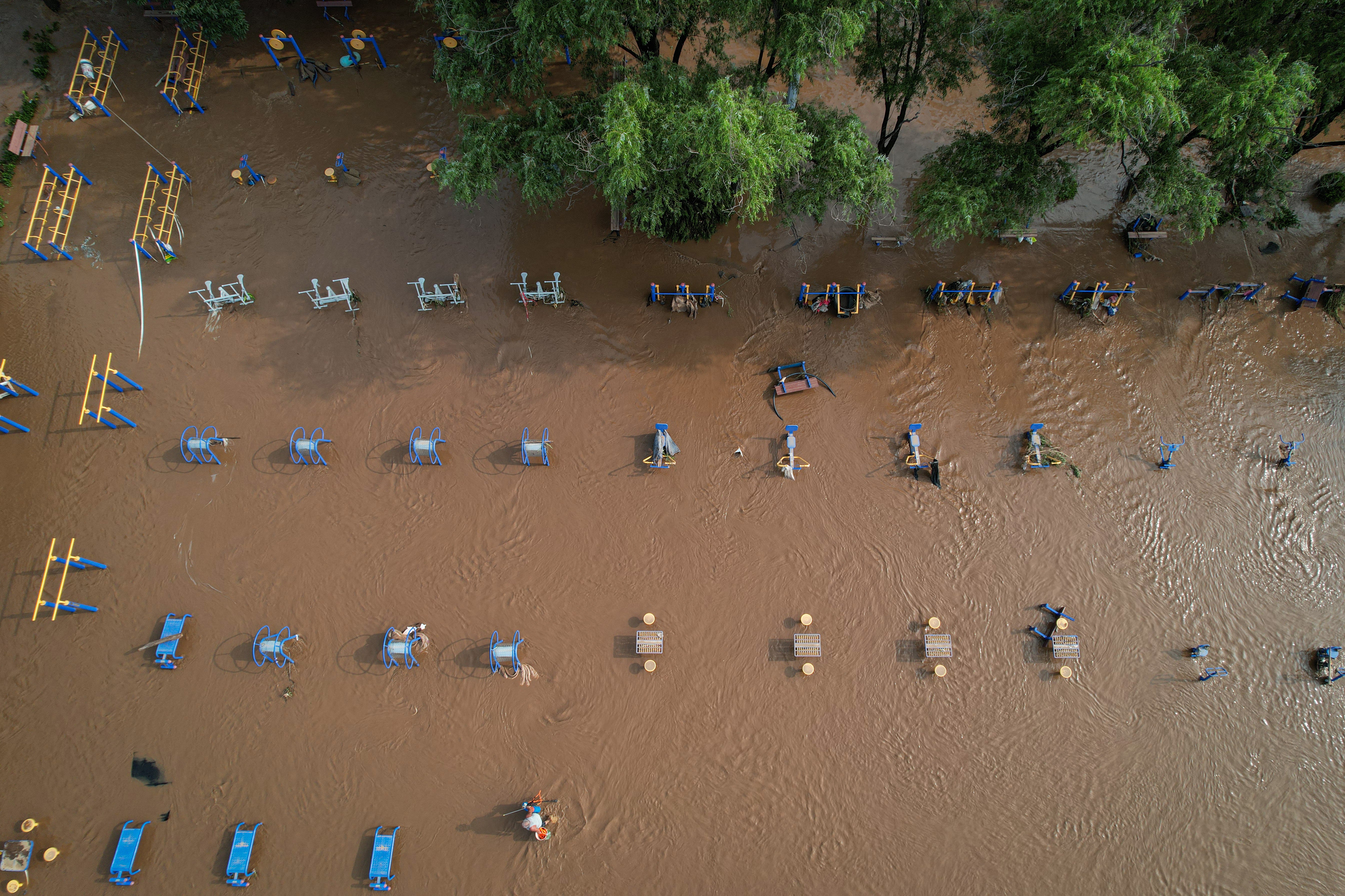 An aerial view shows a flooded public exercise centre after heavy rains at Taishitun village in Miyun district