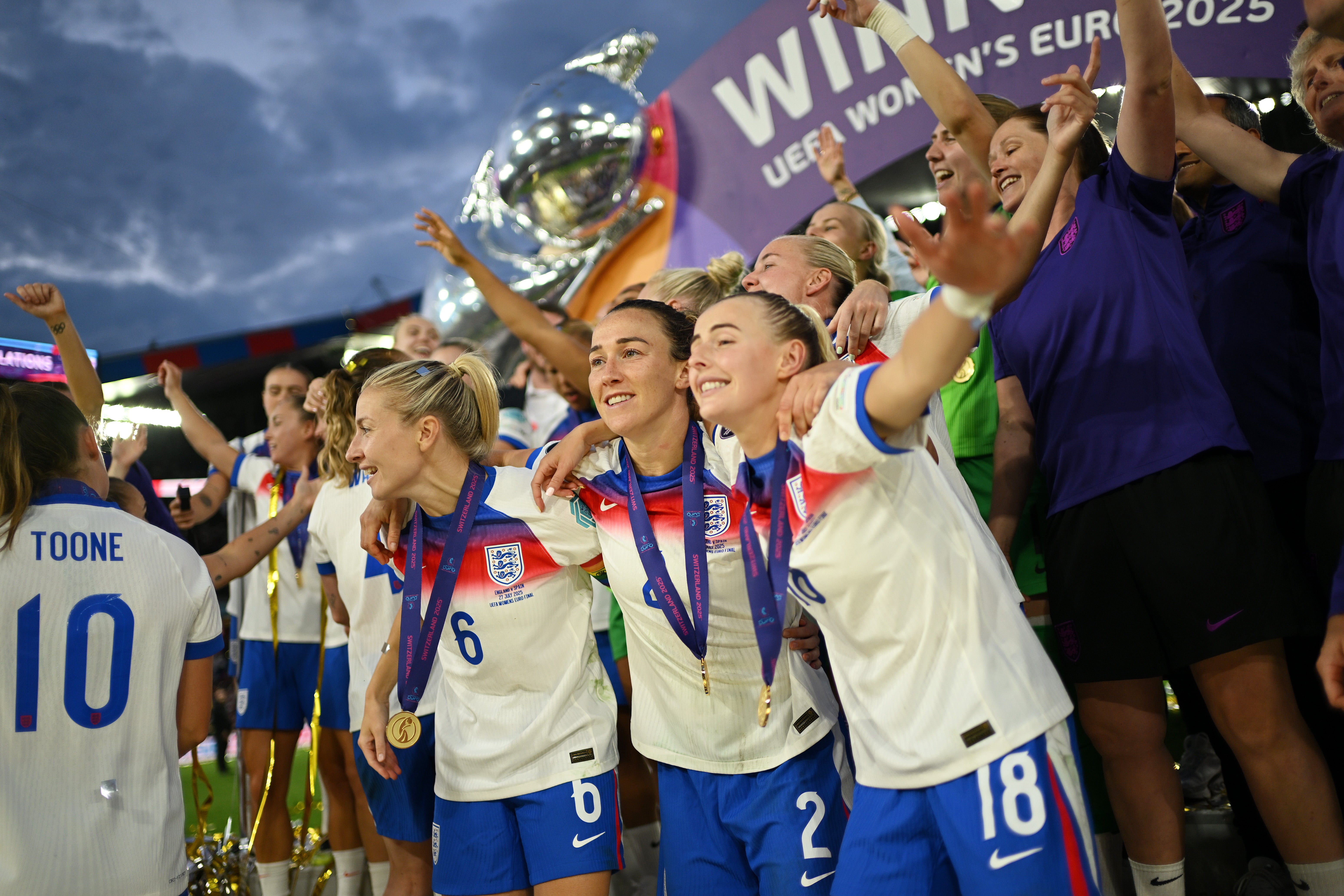 Leah Williamson, Lucy Bronze and Chloe Kelly celebrate following the team's victory in the Euro 2025 final