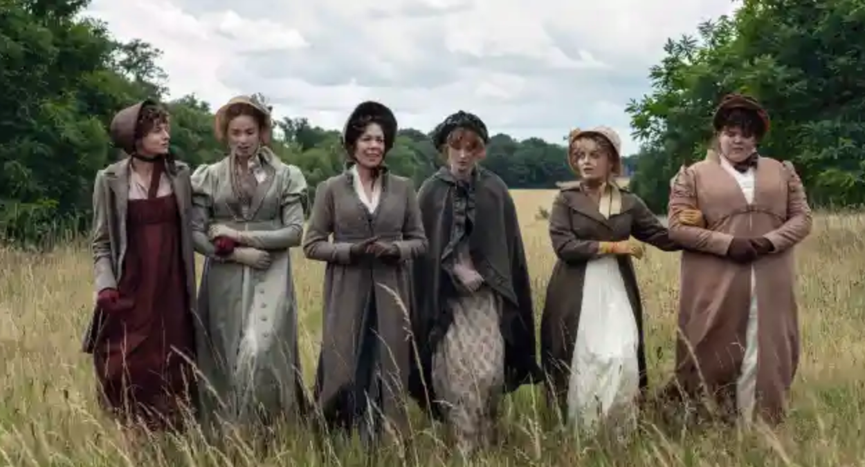 Emma Corrin as Elizabeth Bennet, Freya Mavor as Jane Bennet, Olivia Colman as Mrs Bennet, Hopey Parish as Mary Bennet, Rhea Norwood as Lydia Bennet, Hollie Avery as Kitty Bennet in Netflix’s 'Pride & Prejudice'