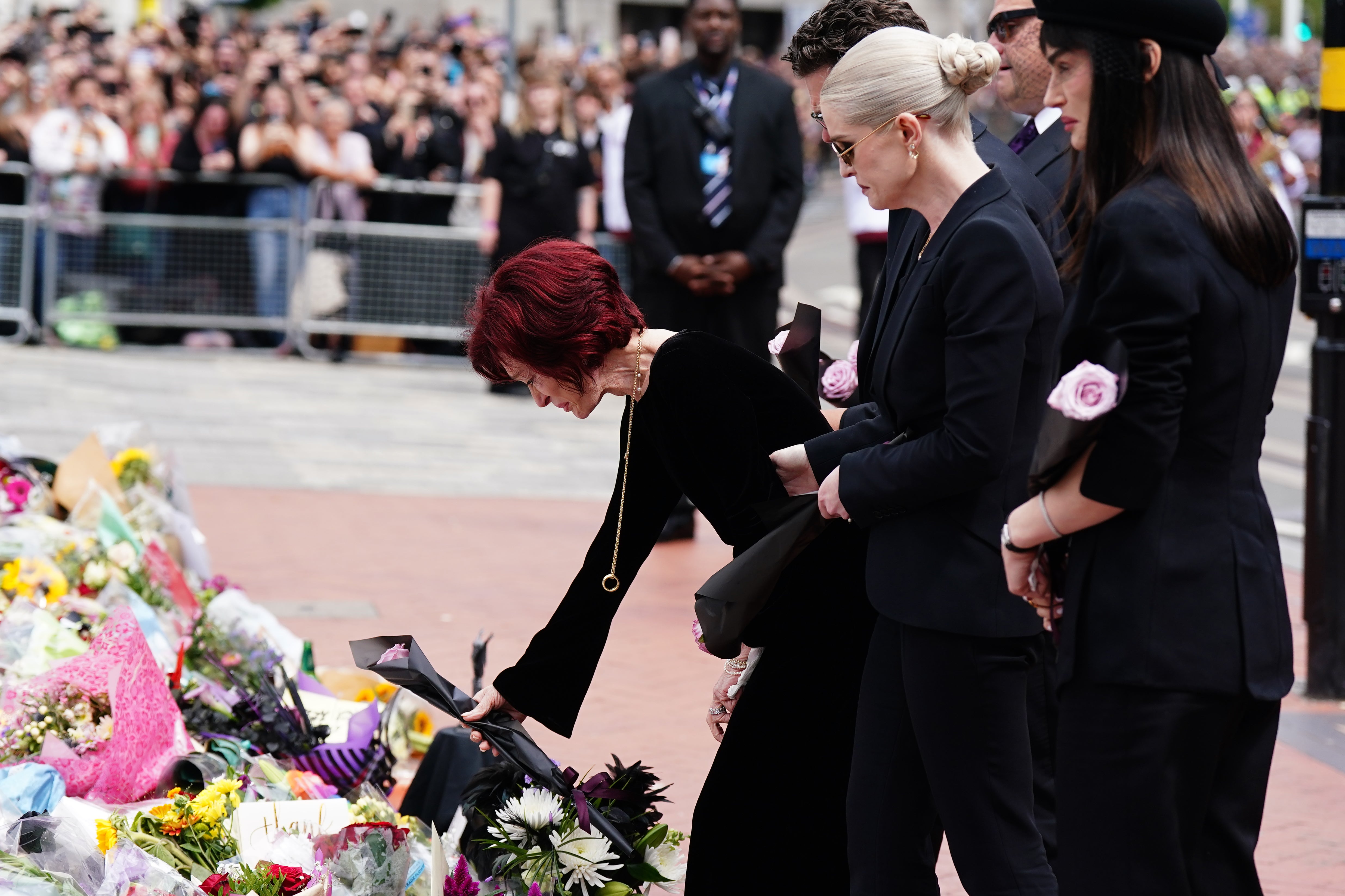 Sharon Osbourne lays flowers at the poignant celebration of Ozzy Osbourne’s life