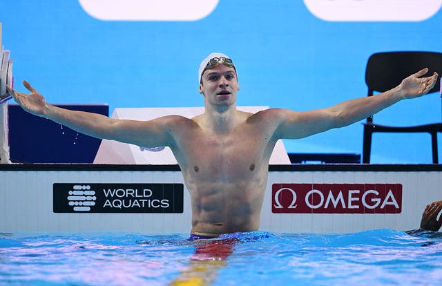 <p>Marchand set the new world record in his semi-final on Wednesday</p>