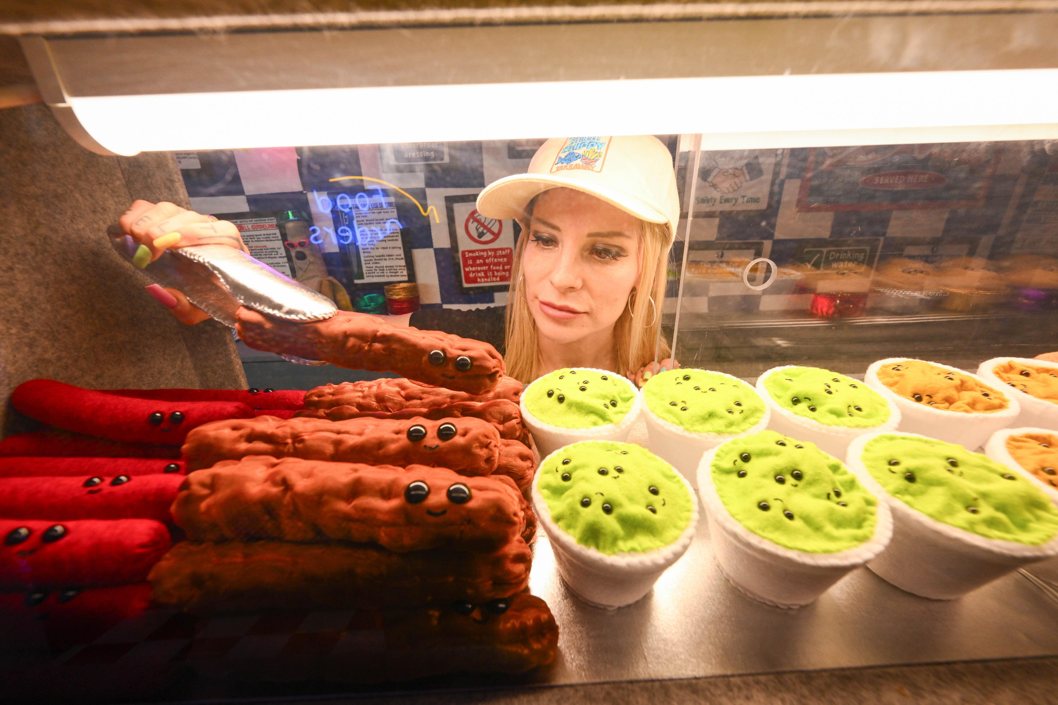 Artist Lucy Sparrow at The Bourdon Street Chippy exhibition, an immersive, hand-stitched fish and chip shop, on display at the Lyndsey Ingram Gallery in London (Jack Hall Media Assignments/PA)