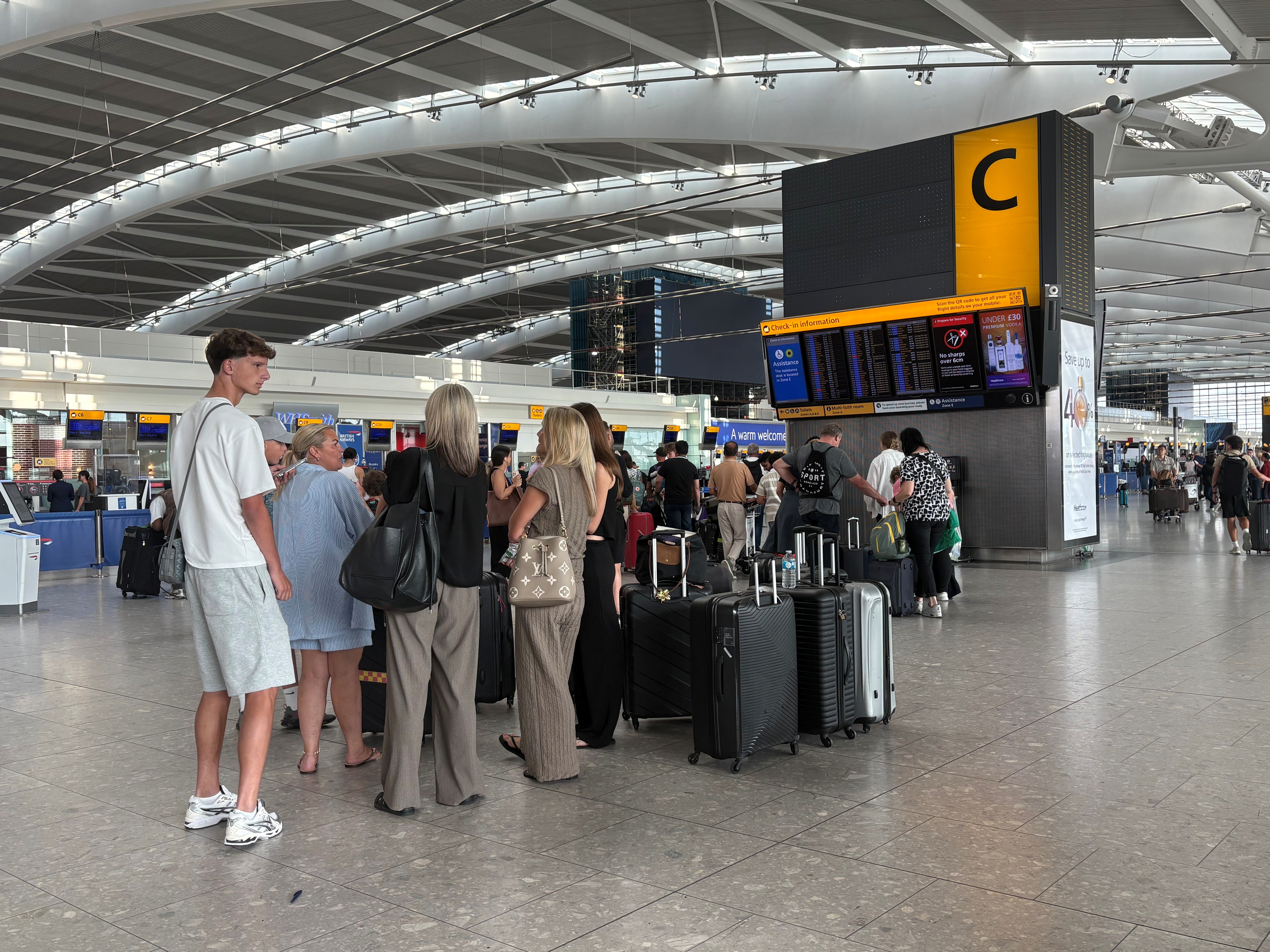 Passengers at Heathrow Terminal 5 on Wednesday
