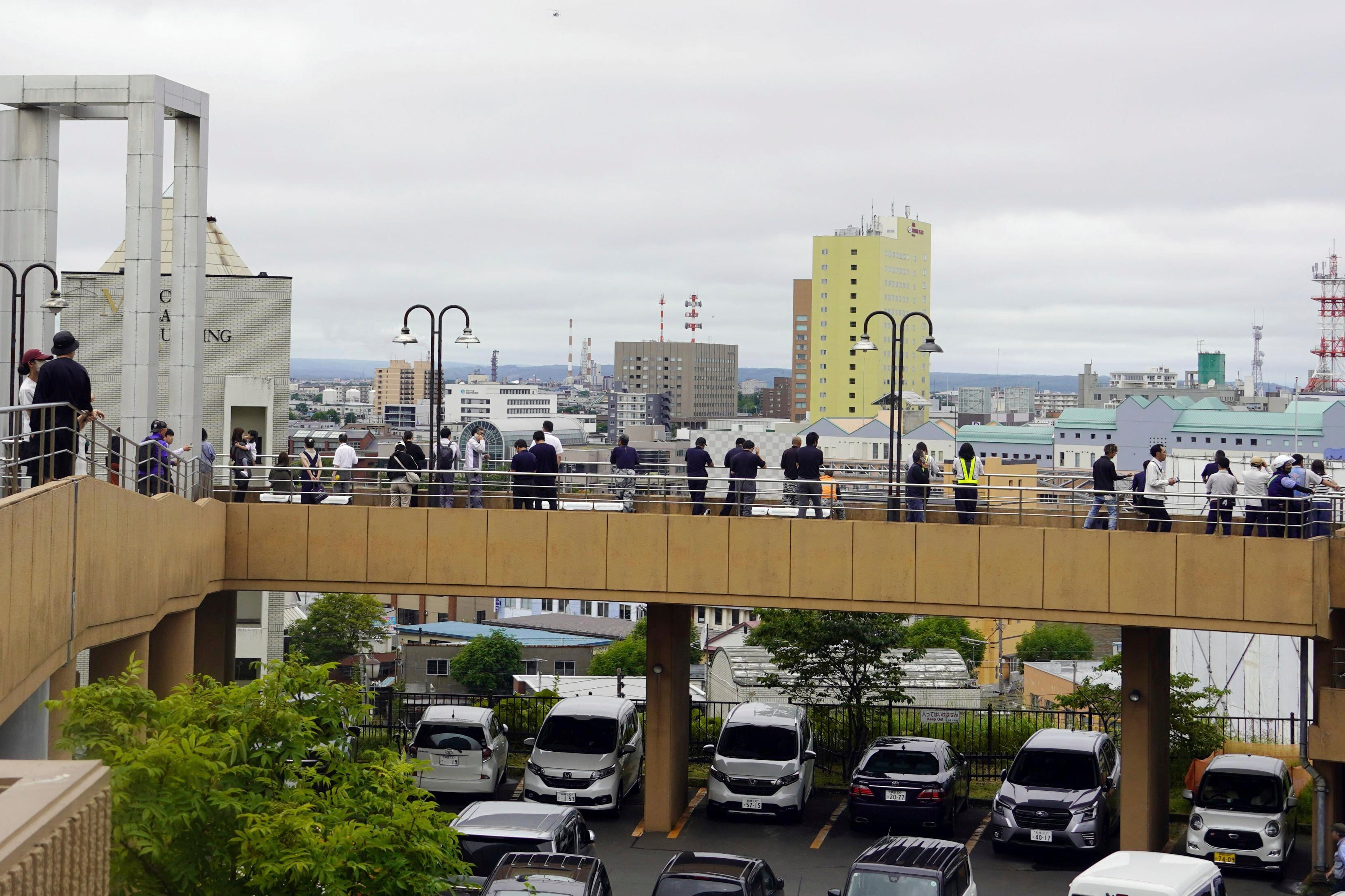 People take shelter at a temporary evacuation site in Kushiro, Hokkaido, northern Japan Wednesday