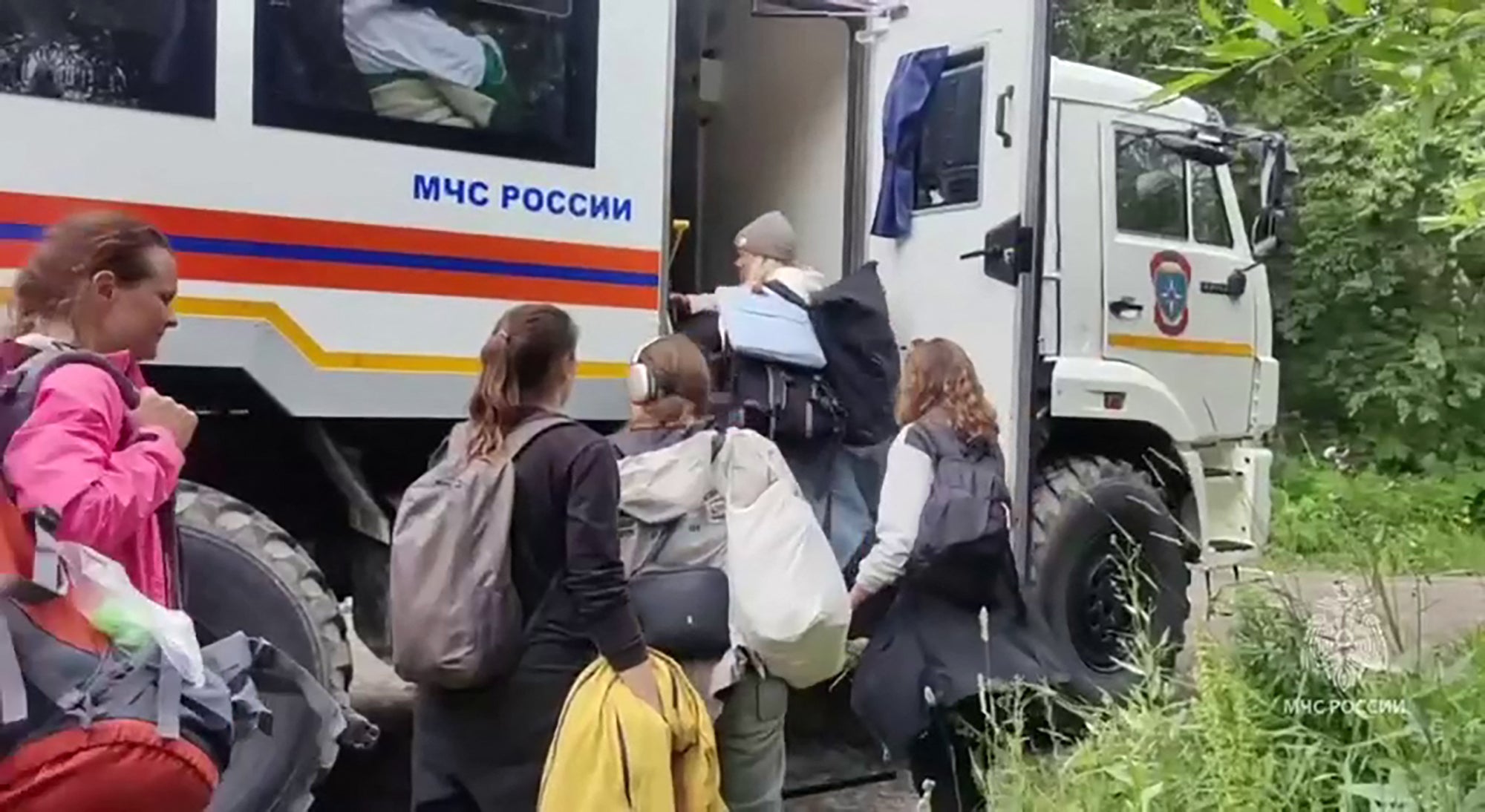 Rescuers evacuating people in Russia's Kamchatka region