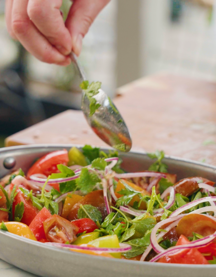 At their peak, heritage tomatoes need almost nothing – just good seasoning, sharp herbs and a glug of olive oil