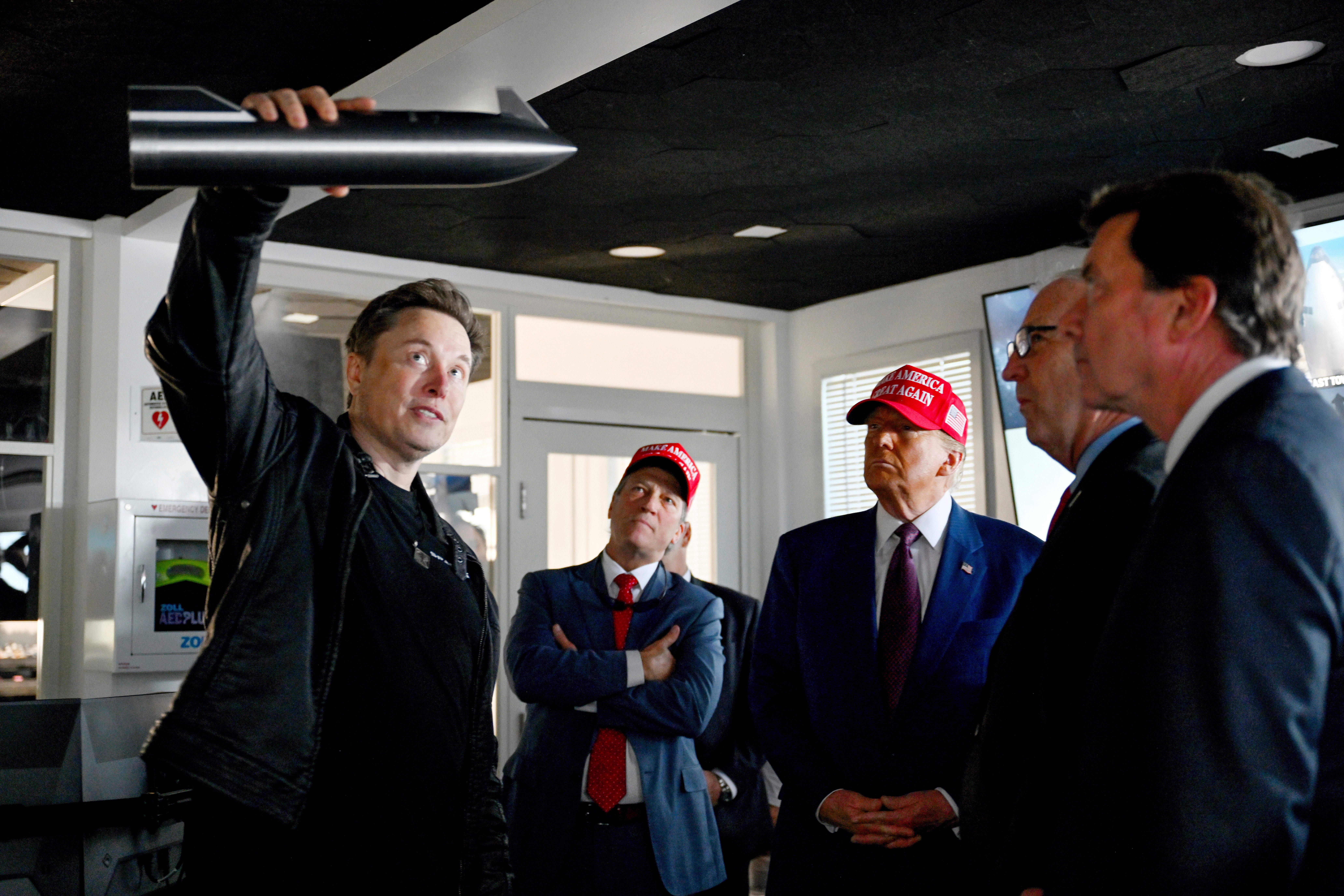 President-elect Donald Trump listens as Elon Musk explains the operations ahead of the launch of the sixth test flight of the SpaceX Starship rocket, Nov. 19, 2024, in Boca Chica, Texas. (Brandon Bell/Pool via AP, File)