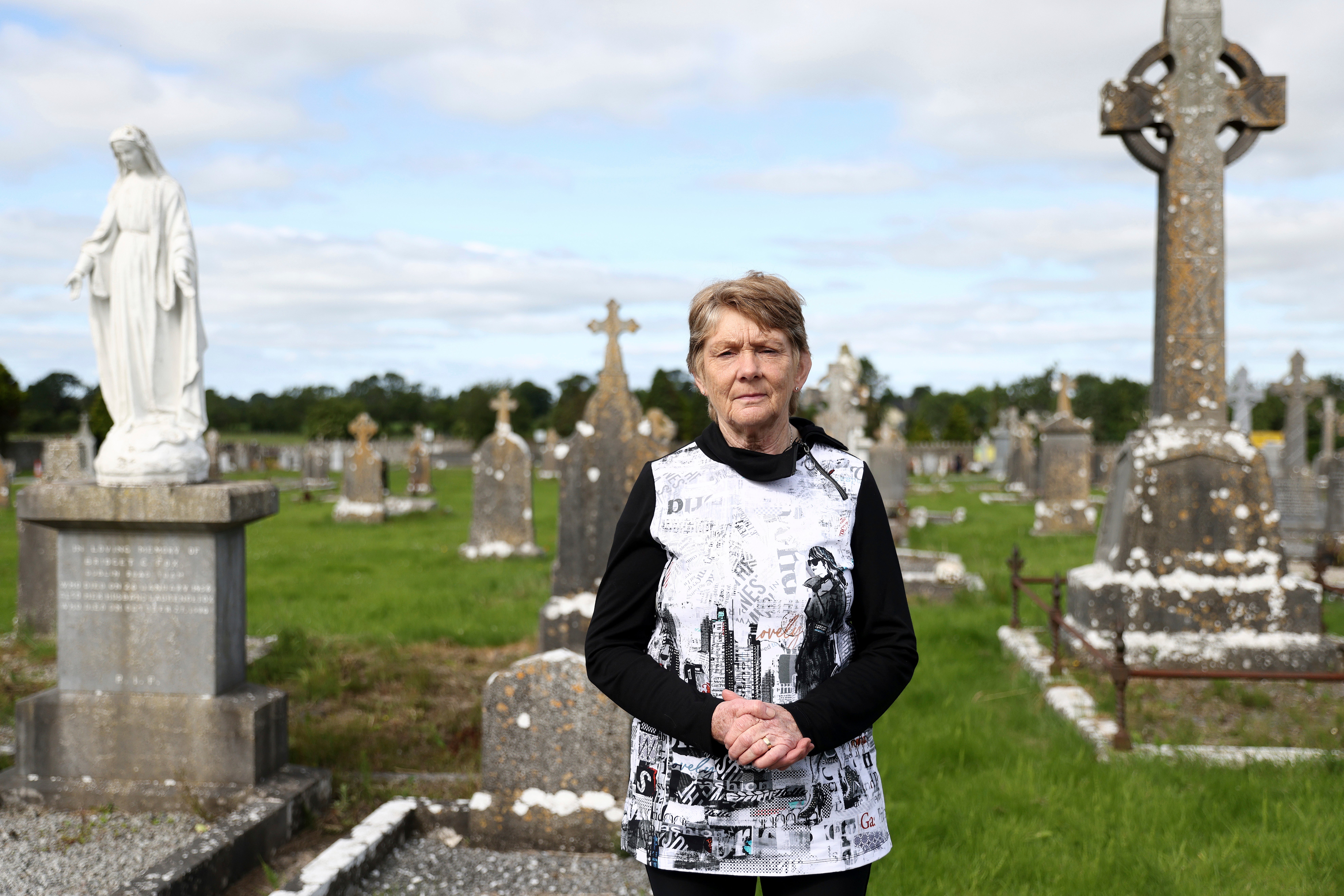 Historian Catherine Corless poses for a photo at Tuam cemetery, Ireland, in Tuam, Ireland, July 7, 2025