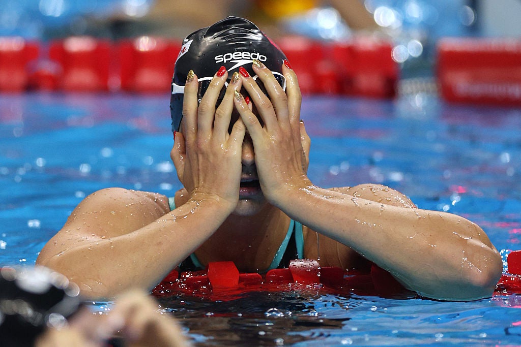 McIntosh swore when she saw her time wasn't quite quick enough to break the record