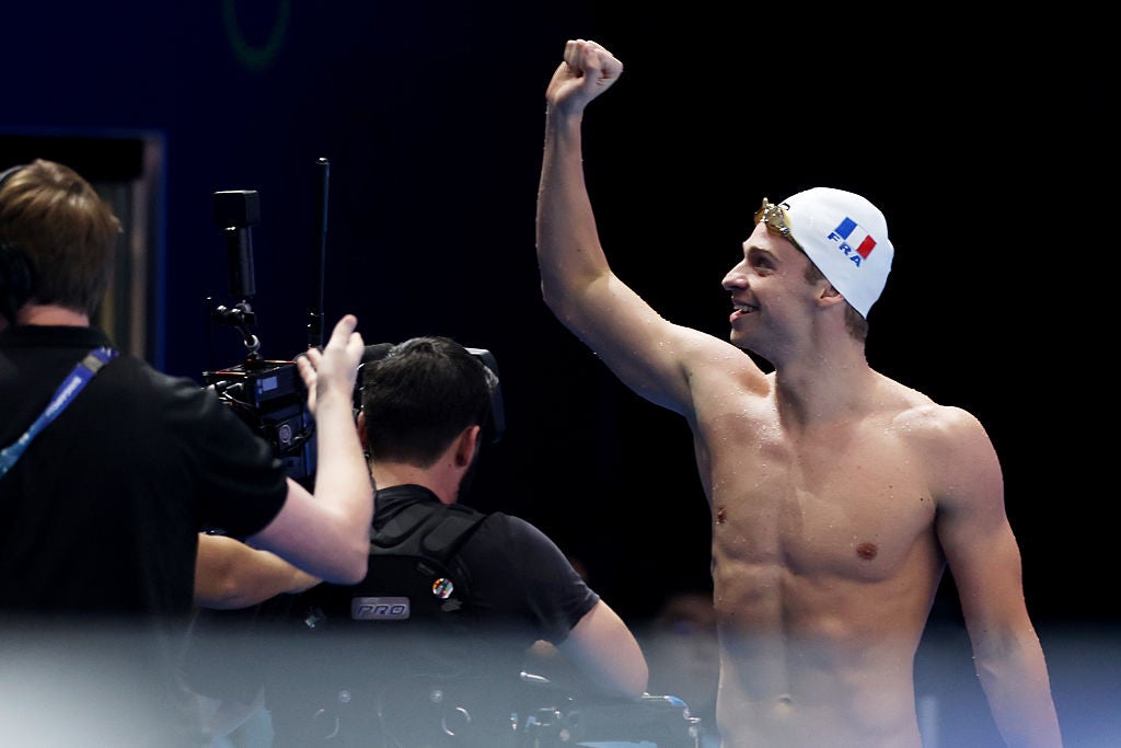 Marchand celebrated a first gold of the championships, with another chance in the 400m individual medley to come