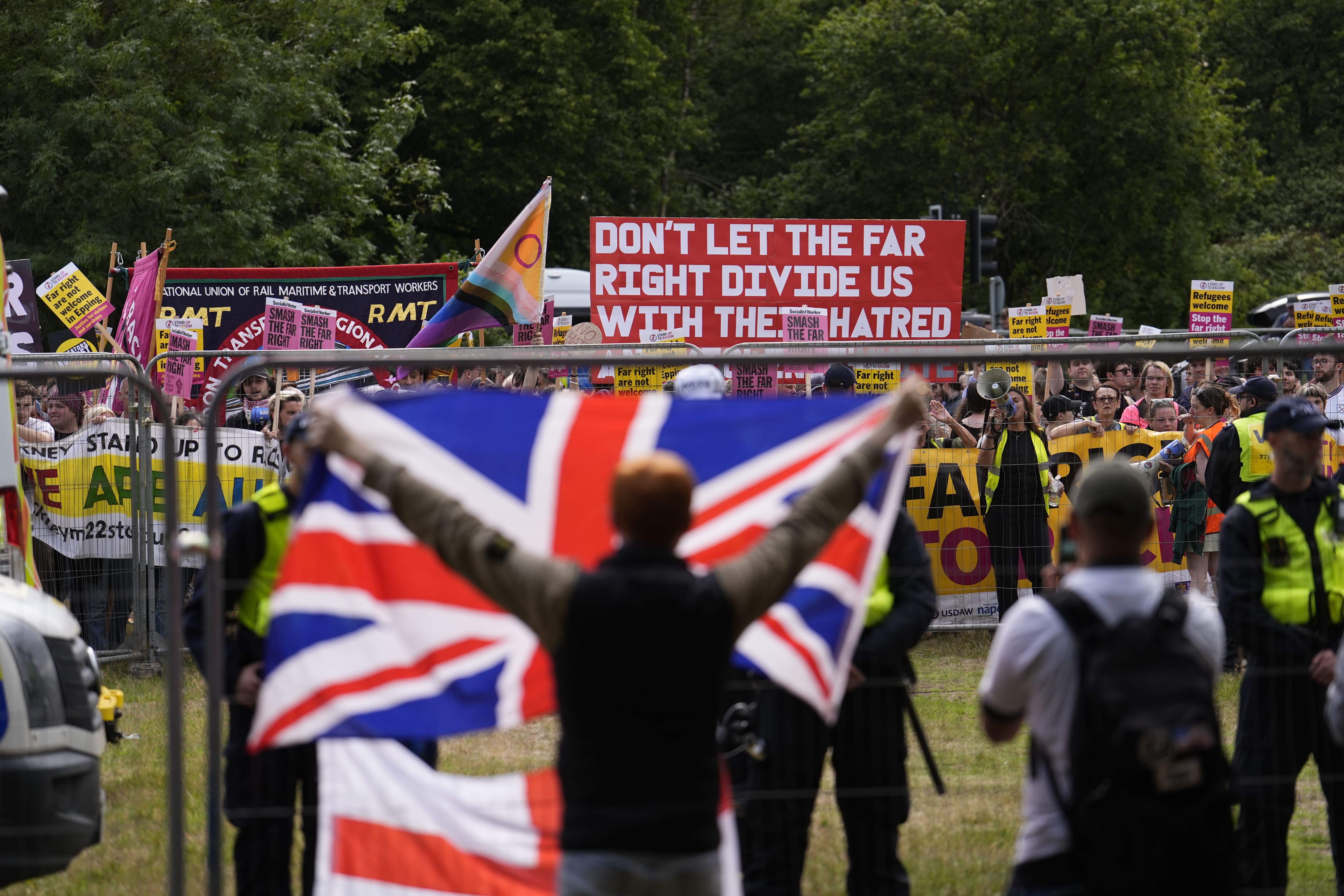 Protesters outside the Bell Hotel in Epping (Jordan Pettit/ PA)