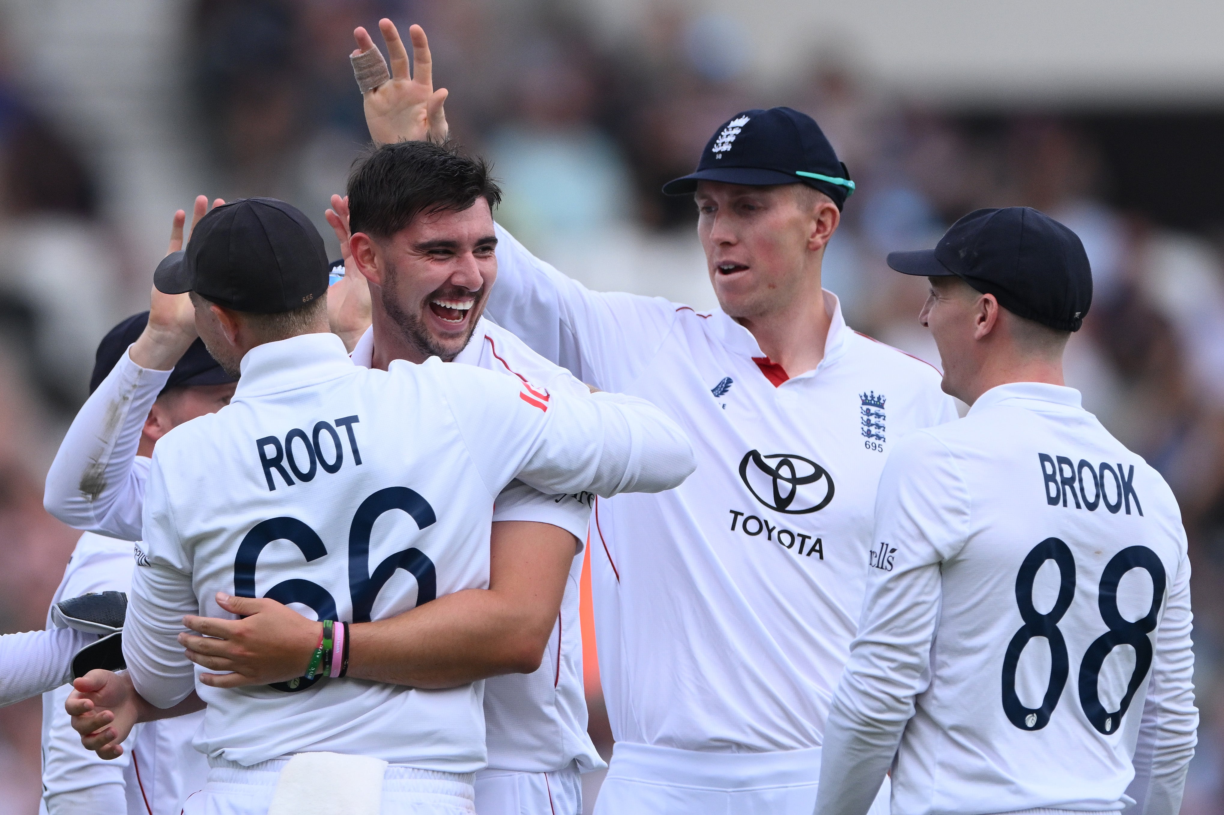 England celebrate after Josh Tongue (second left) dismisses Ravindra Jadeja