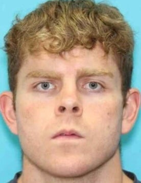 James Andrew McGann, a 28-year-old Springdale man, was taken into police custody late Wednesday afternoon in connection with the killing of a couple on an Arkansas walking trail