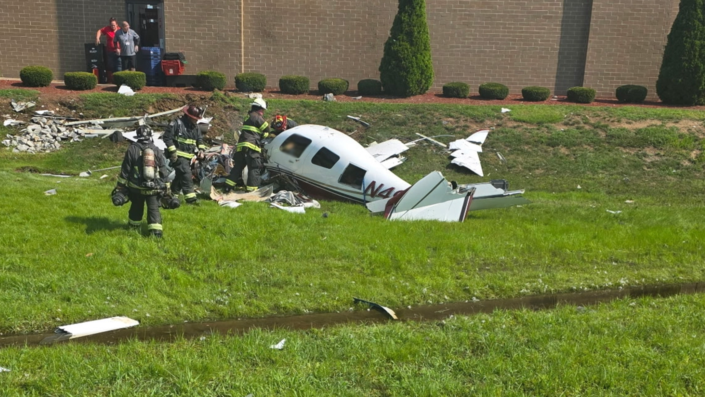 Firefighters respond to a fatal plane crash in Greenwood, Indiana, on Wednesday. Anh-Thu Nguyen, a 44-year-old pilot attempting to recreate her 2024 solo flight around the world, was killed in the crash