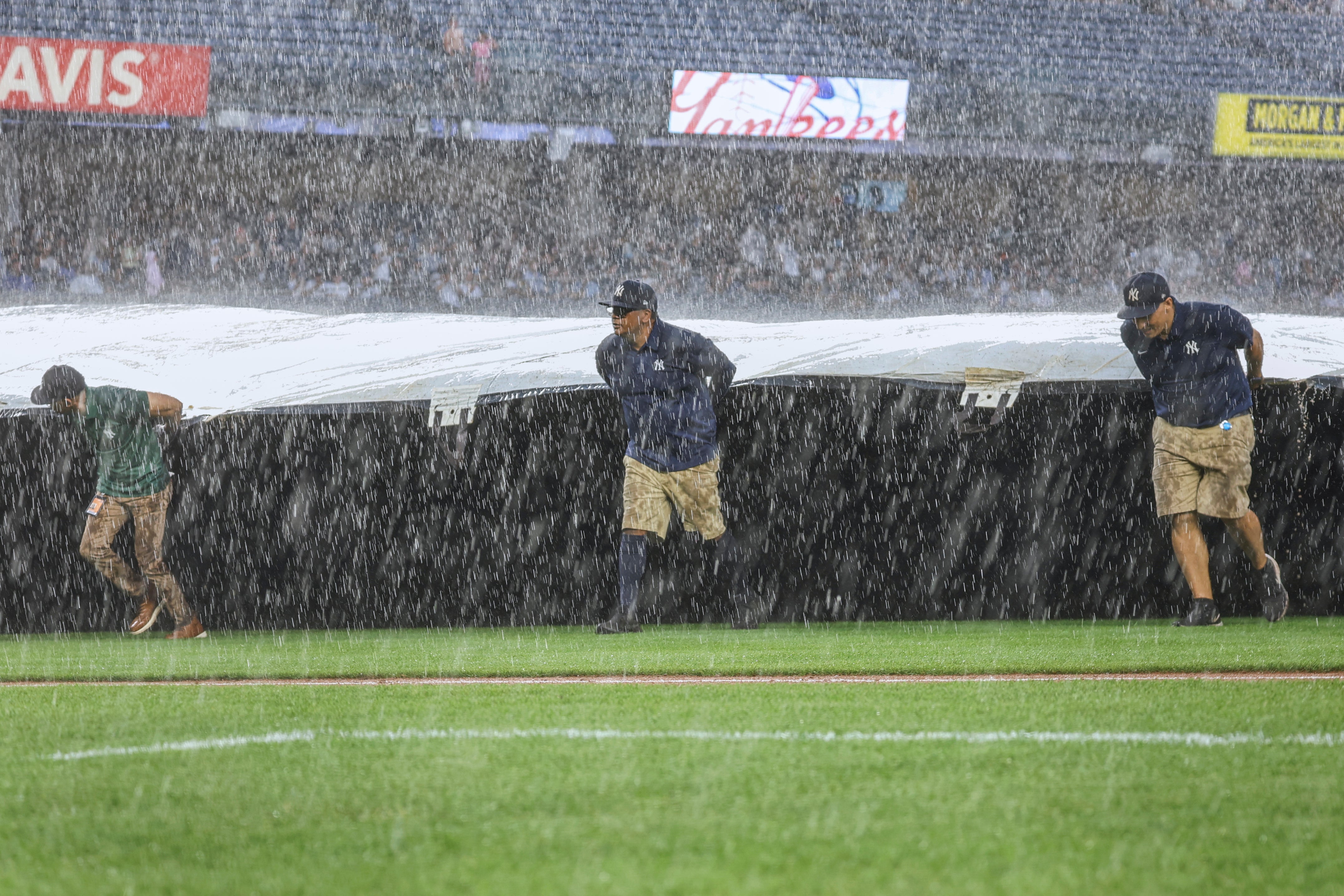 Major storms hit New York City and the East Coast on Thursday, leading to flight delays and commuter chaos. The Yankees game had to go into a rain delay
