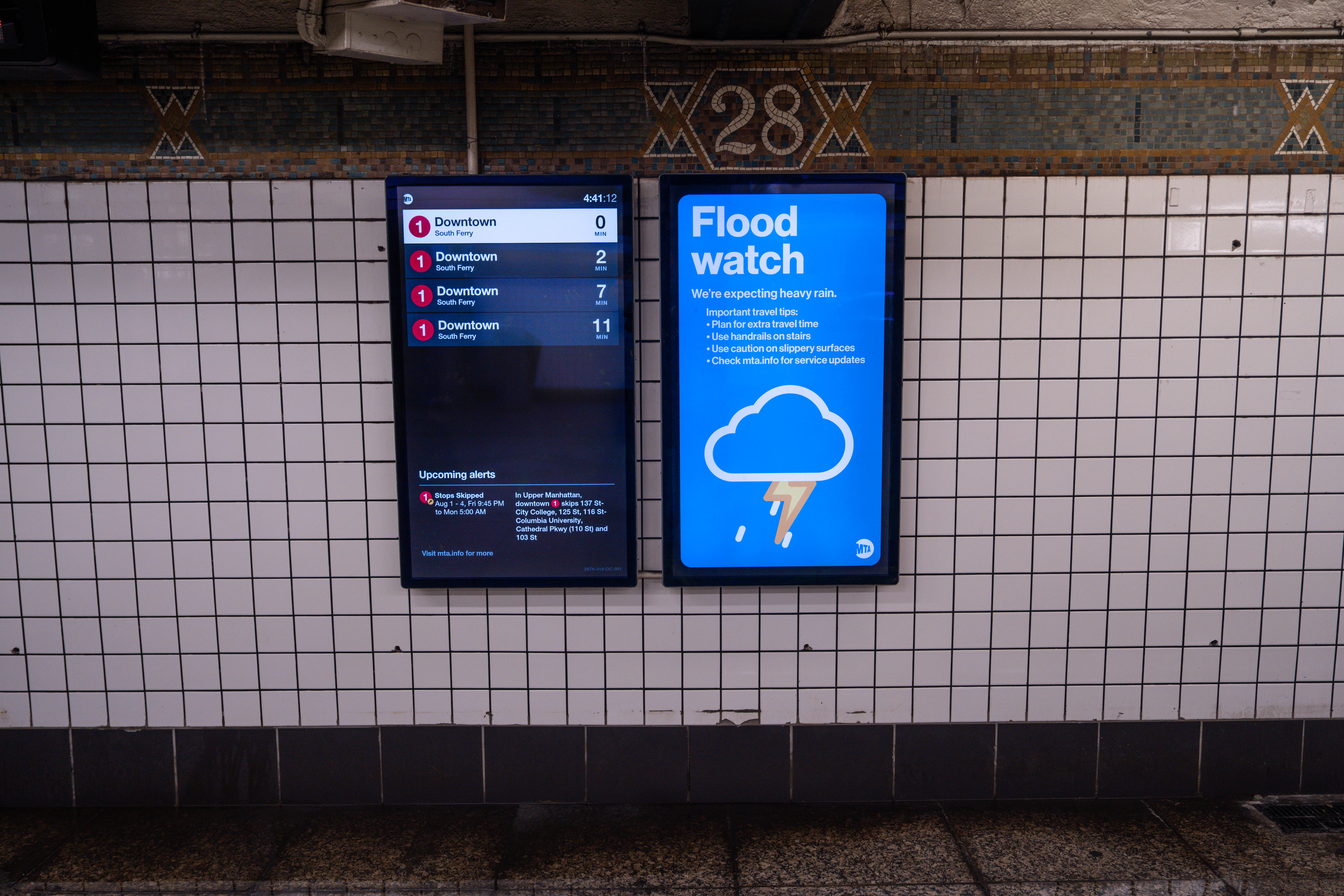 A flood watch warning inside 28 Street Subway station on July 31, 2025 in New York City