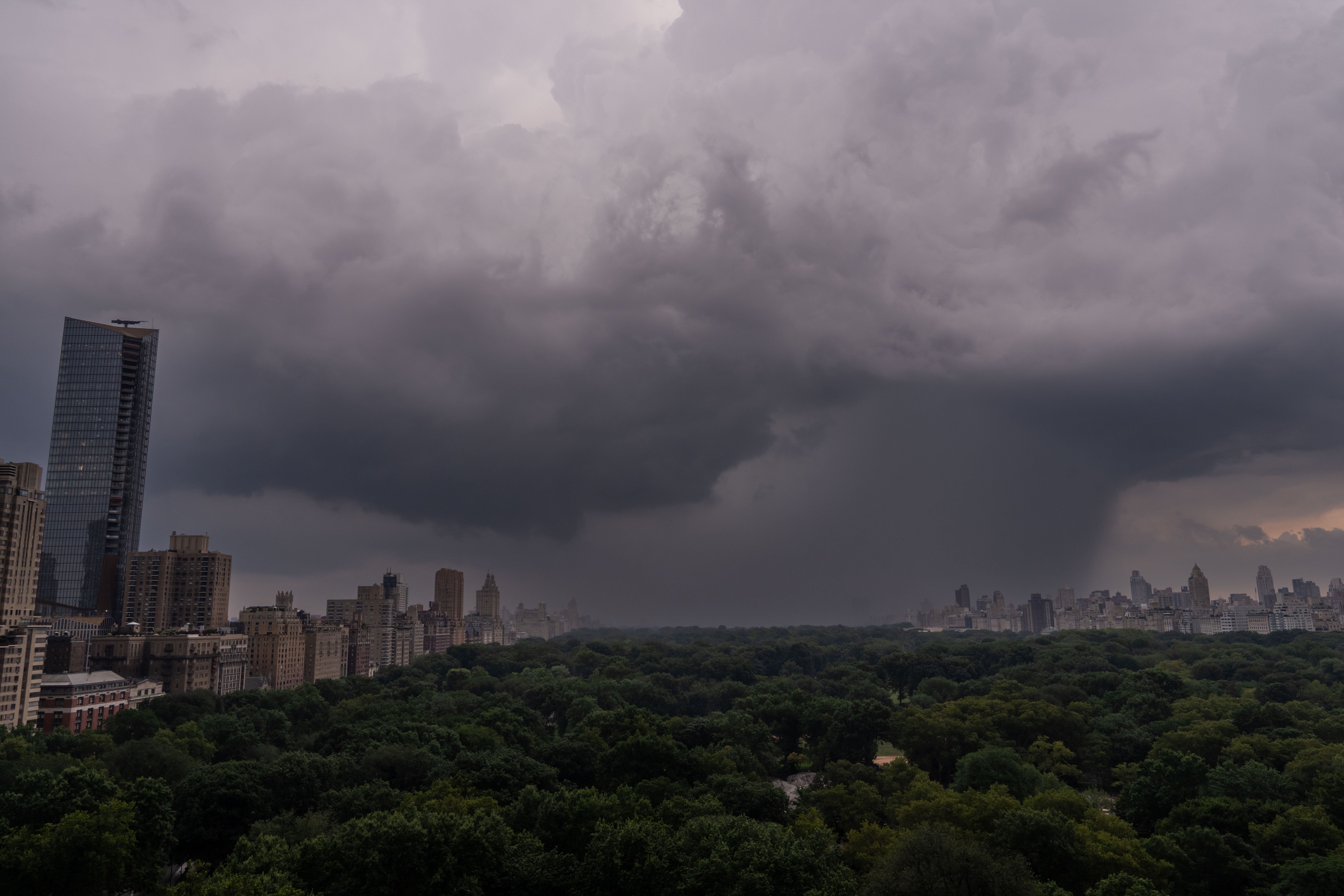 Storm clouds hover near Central Park ahead of torrential downpours affecting millions