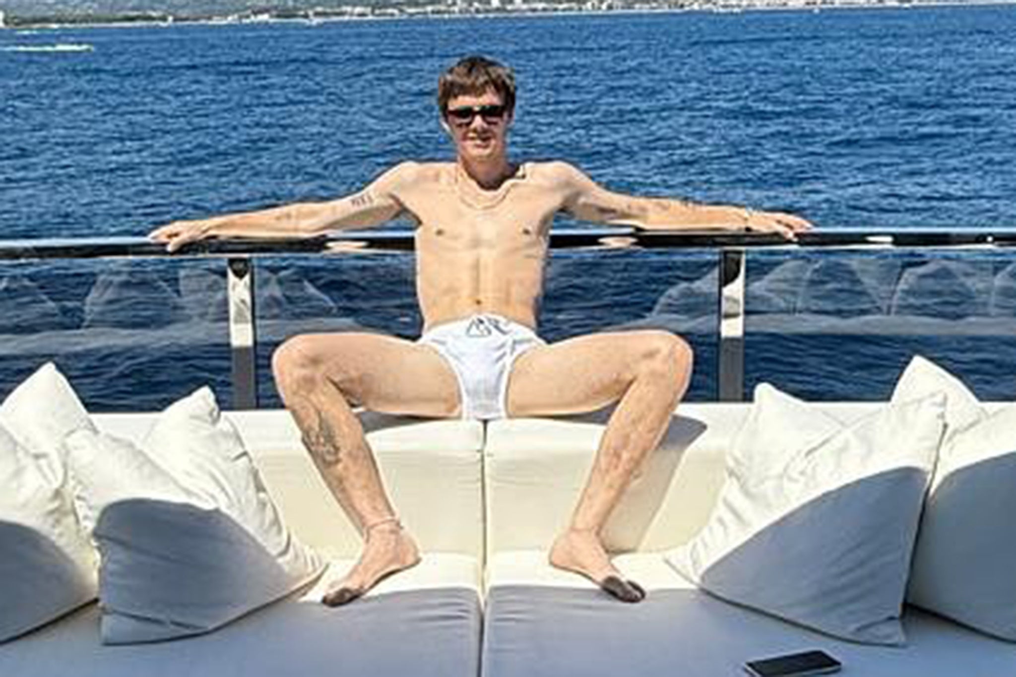 Cruz Beckham poses in white Speedos on holiday