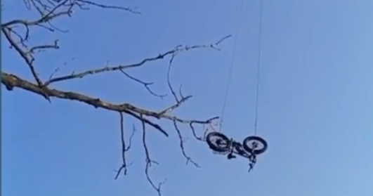 The bike was lowered to the wounded soldier so he could make his escape