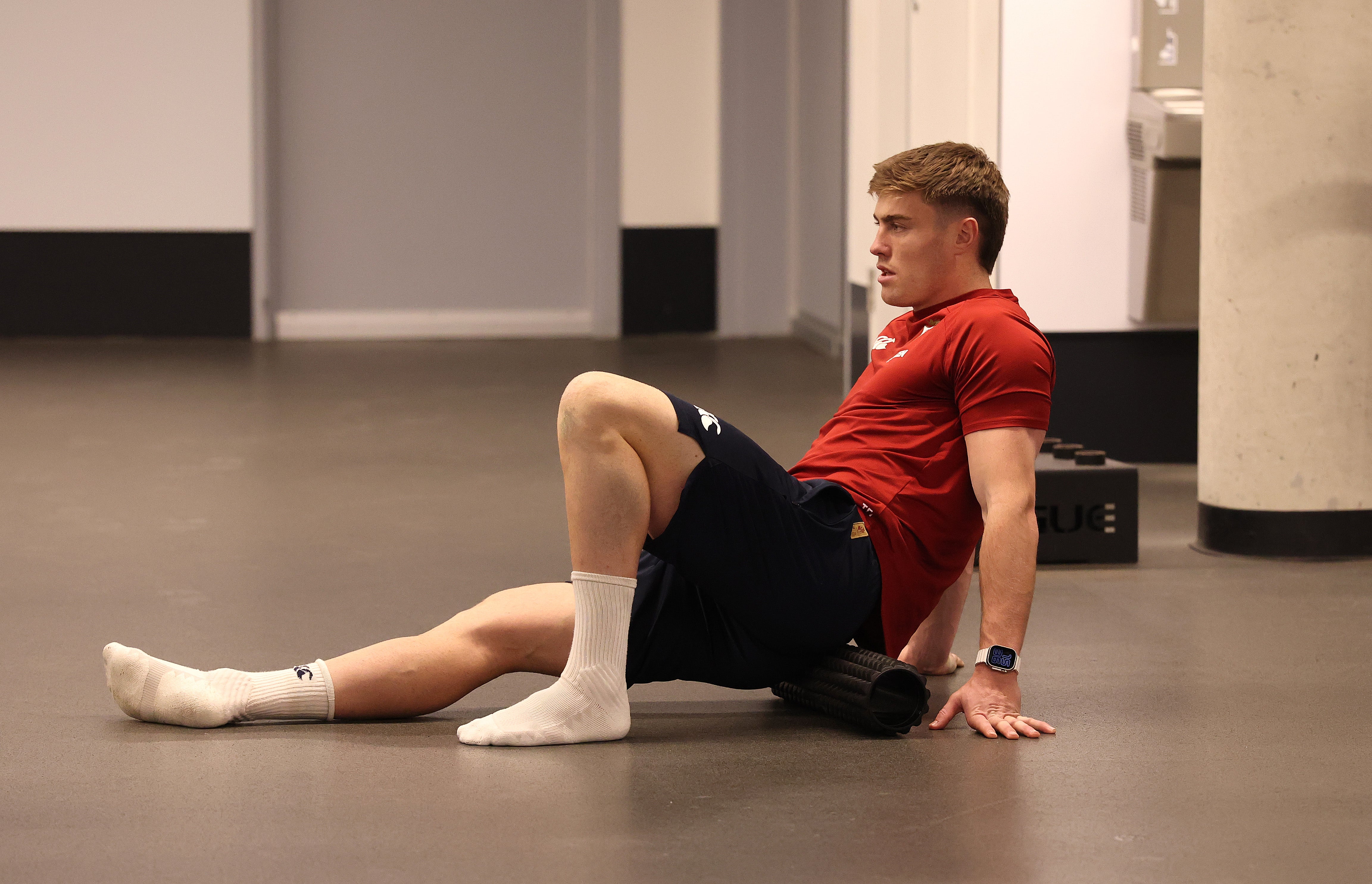 Tommy Freeman stretches during the British & Irish Lions gym session