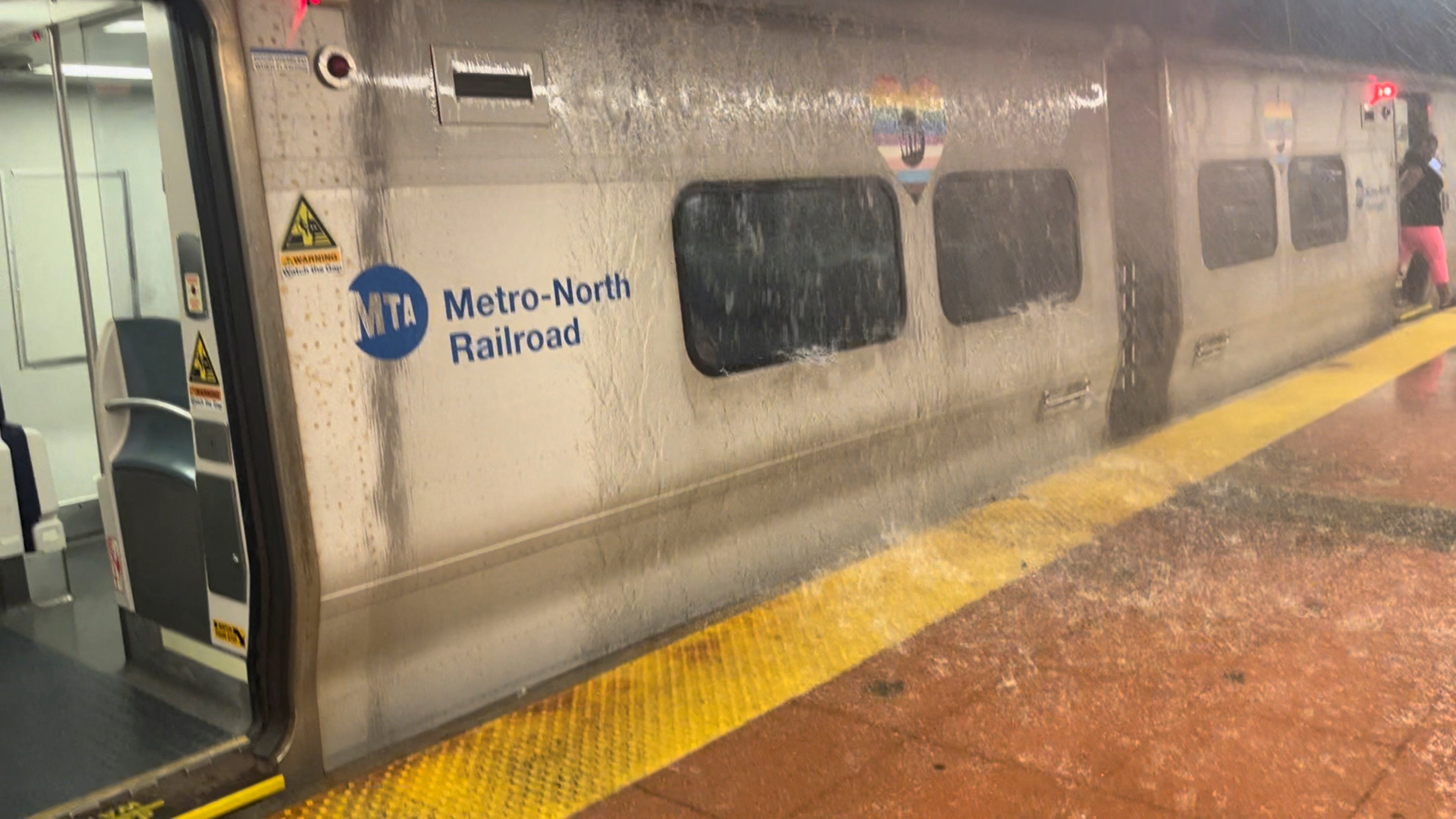 Rainwater pours onto a train carriage in New York City. Mayor Eric Adams issued a state of emergency
