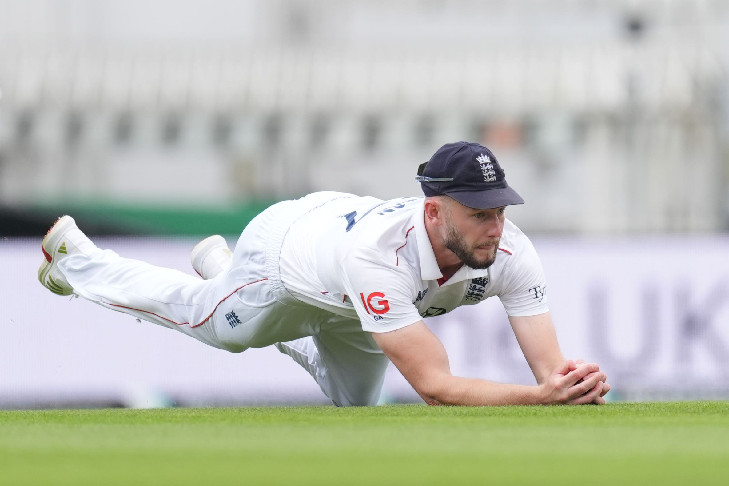 England’s Gus Atkinson takes the catch to remove India’s Akash Deep (Ben Whitley/PA).
