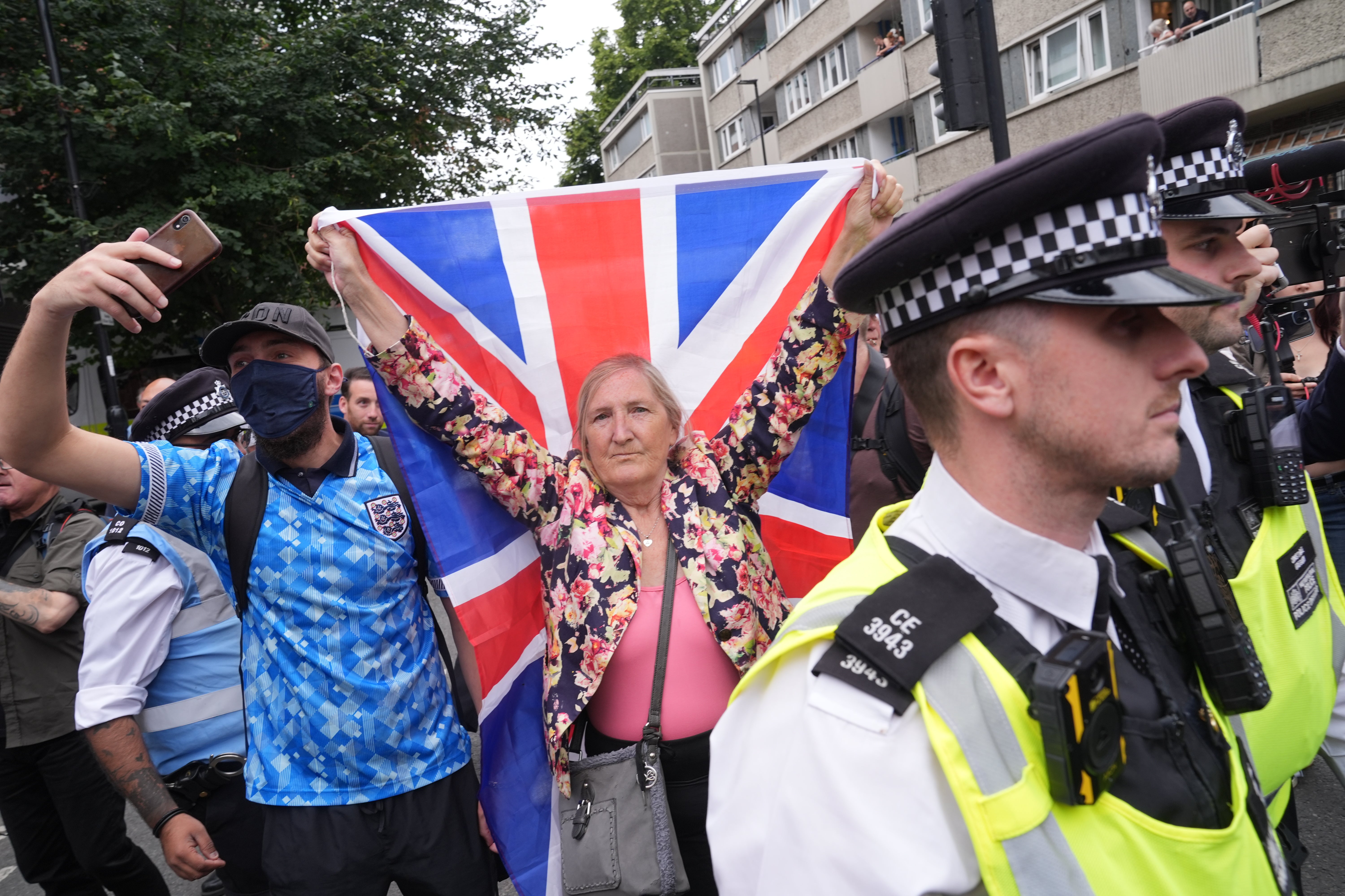 Anti-immigration protesters outside the Thistle City Barbican Hotel in central London, which houses asylum seekers