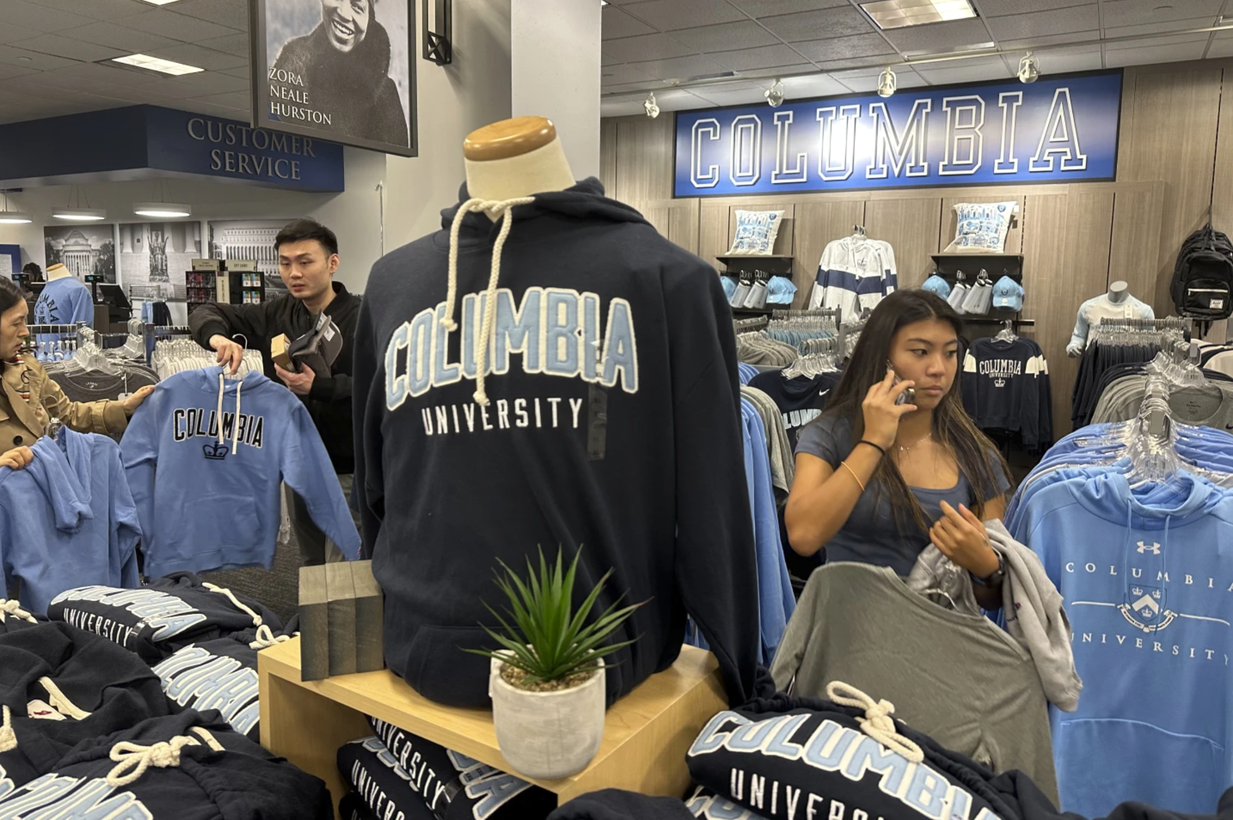 Customers browse the Columbia University bookstore in Manhattan. Columbia Sportswear is suing the school alleging trademark infringement and breach of contract, claiming the school's merchandise looks too similar to its own