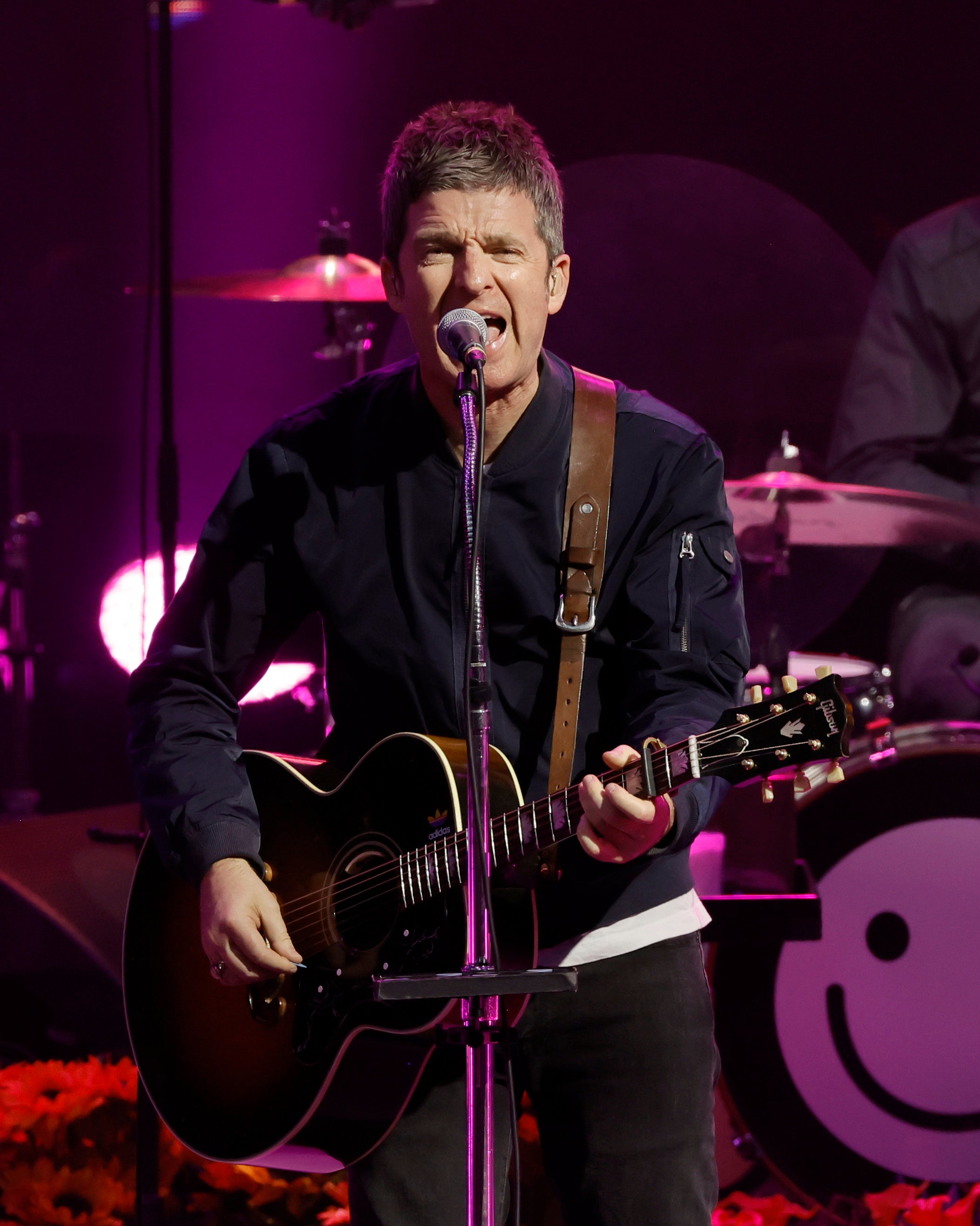 Noel Gallagher pictured onstage in 2023
