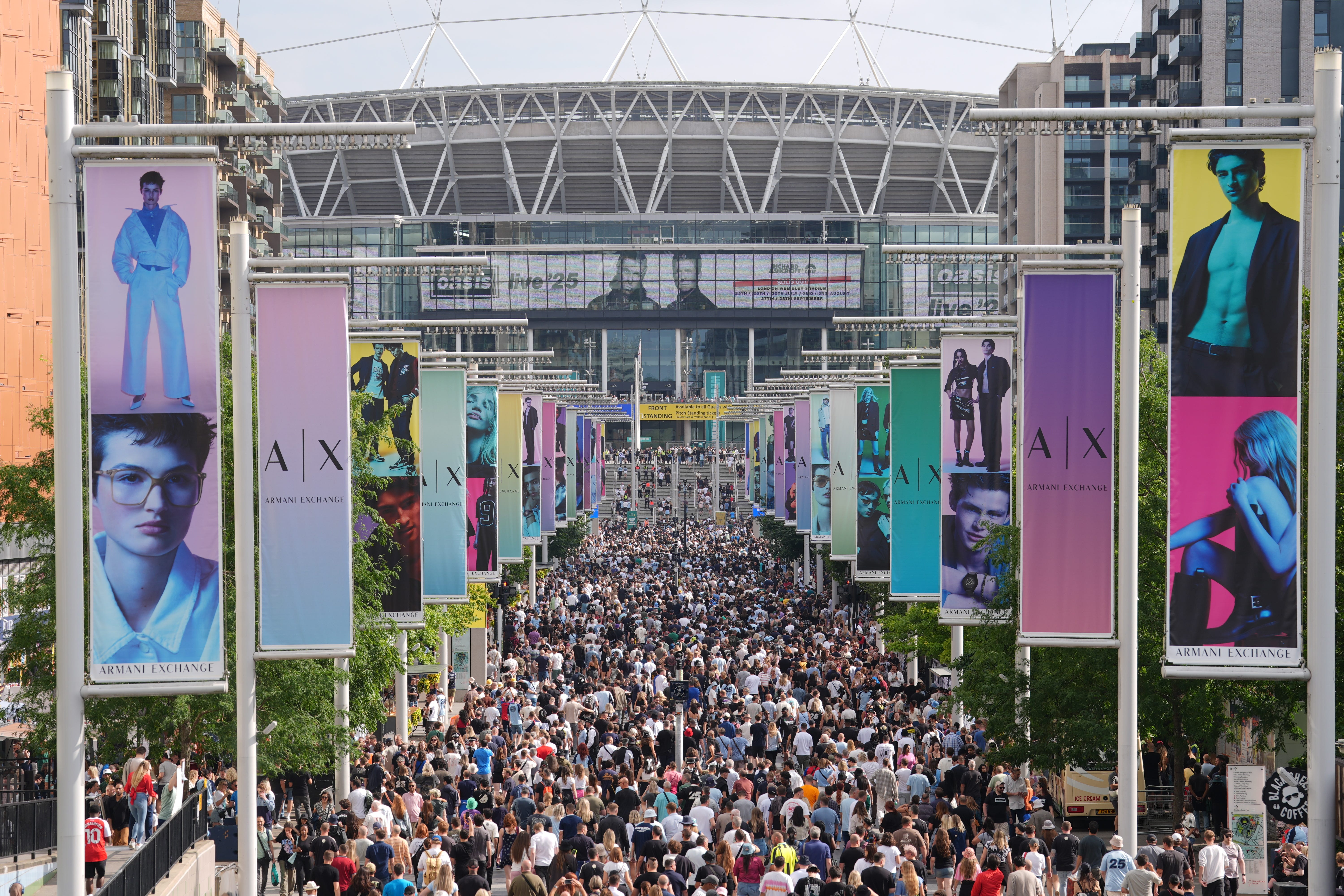 Oasis fans on Wembley Way, ahead of the first night of the Oasis Live ’25 tour opening at Wembley Stadium in London. Picture date: Friday July 25, 2025.