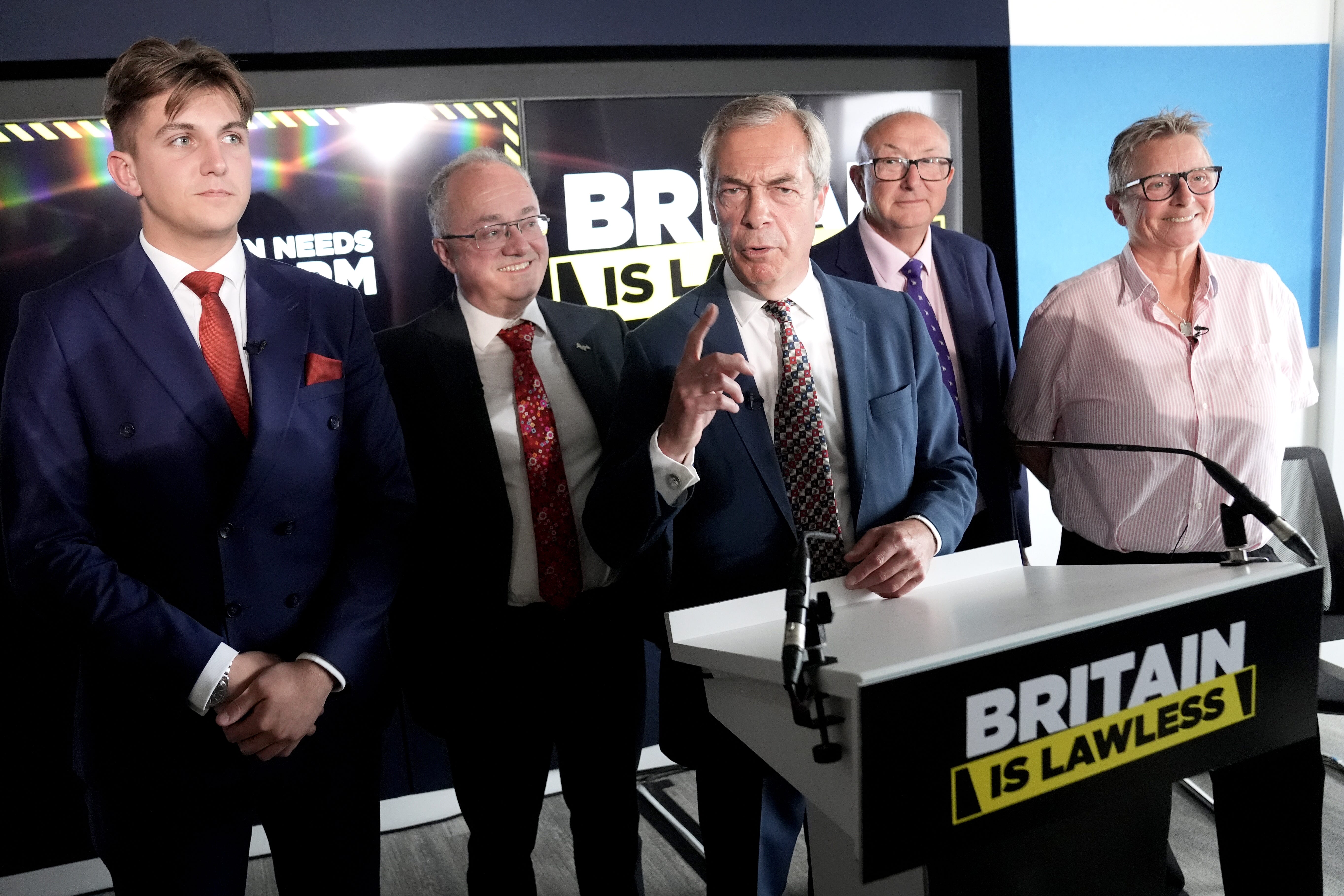 Reform UK party leader Nigel Farage and (from left) George Finch, leader of Warwickshire County Council; Rupert Matthews, police and crime commissioner for Leicestershire; Colin Sutton, Reform’s policing and crime adviser; and former prison governor Vanessa Frake-Harris, the party’s new justice adviser