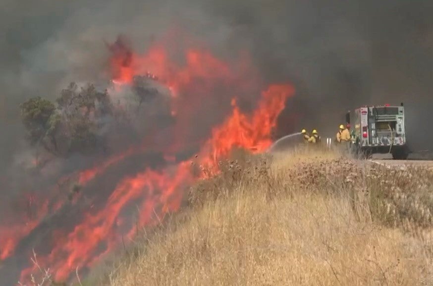 The fire began as a series of smaller blazes along Highway 166, officials said