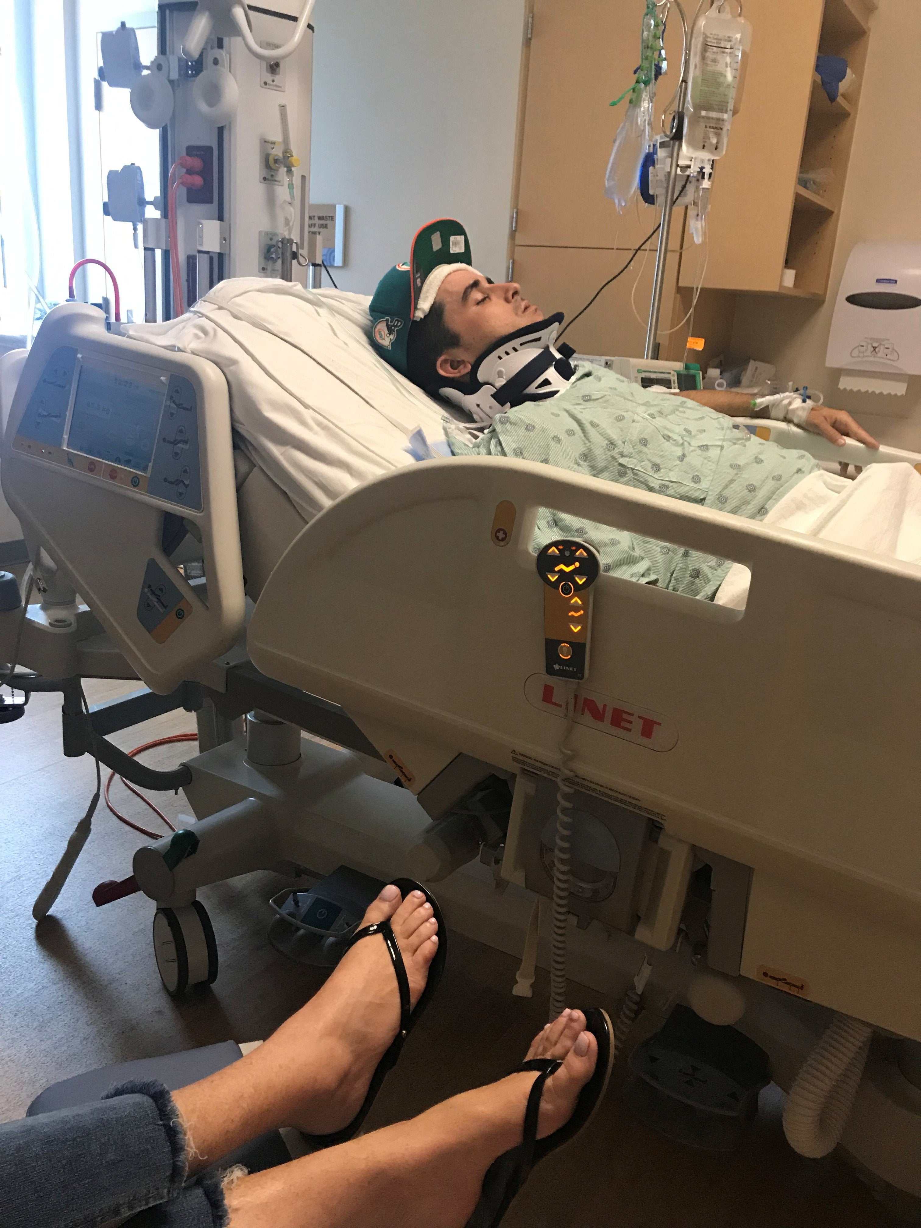Dillon Angulo, who was injured in a 2019 crash involving a Tesla Model S operating on Autopilot, receives treatment in a hospital
