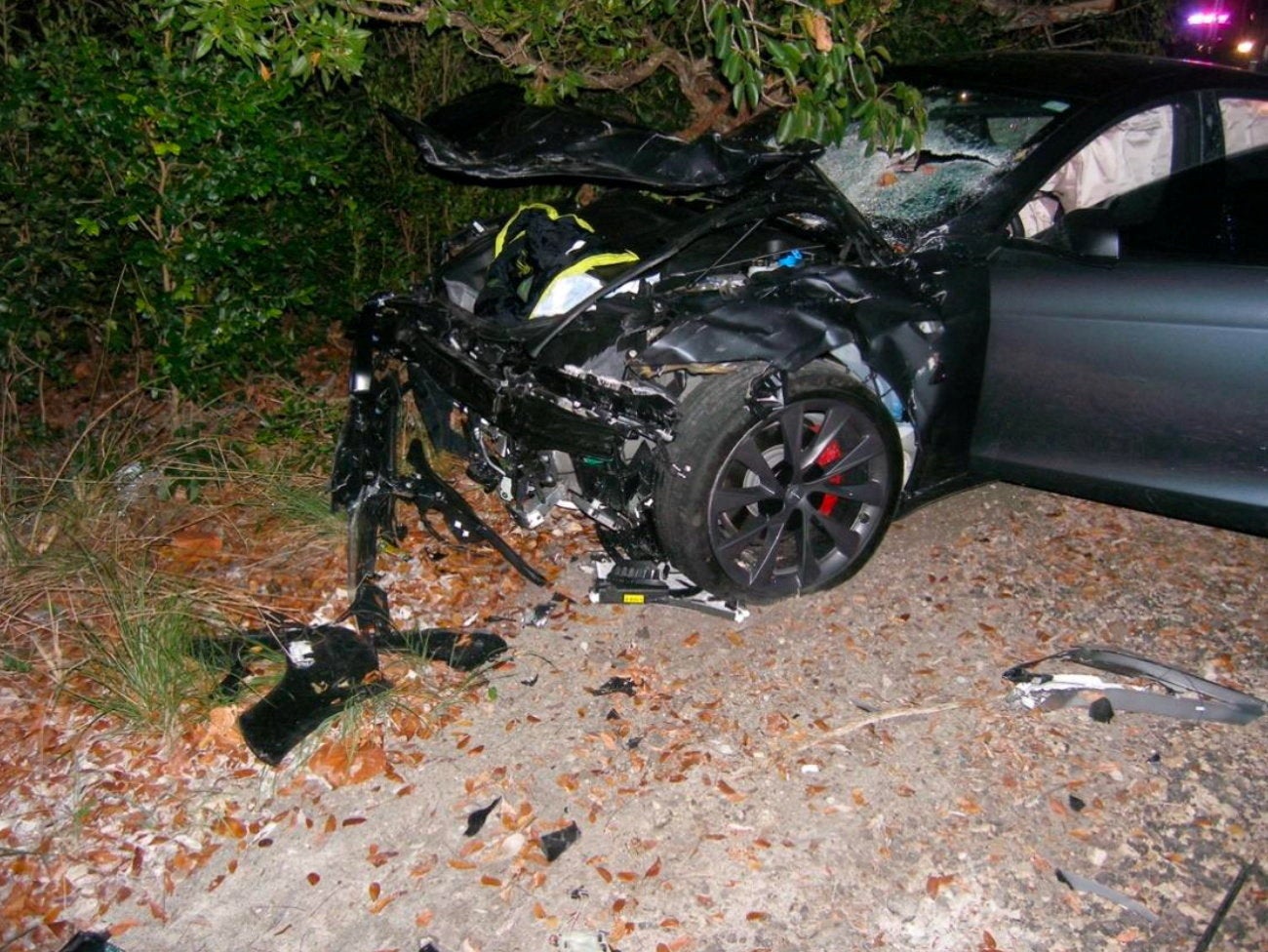 A Tesla Model S lies damaged after it struck a parked Chevrolet Tahoe while operating on Autopilot, in Key Largo, Florida