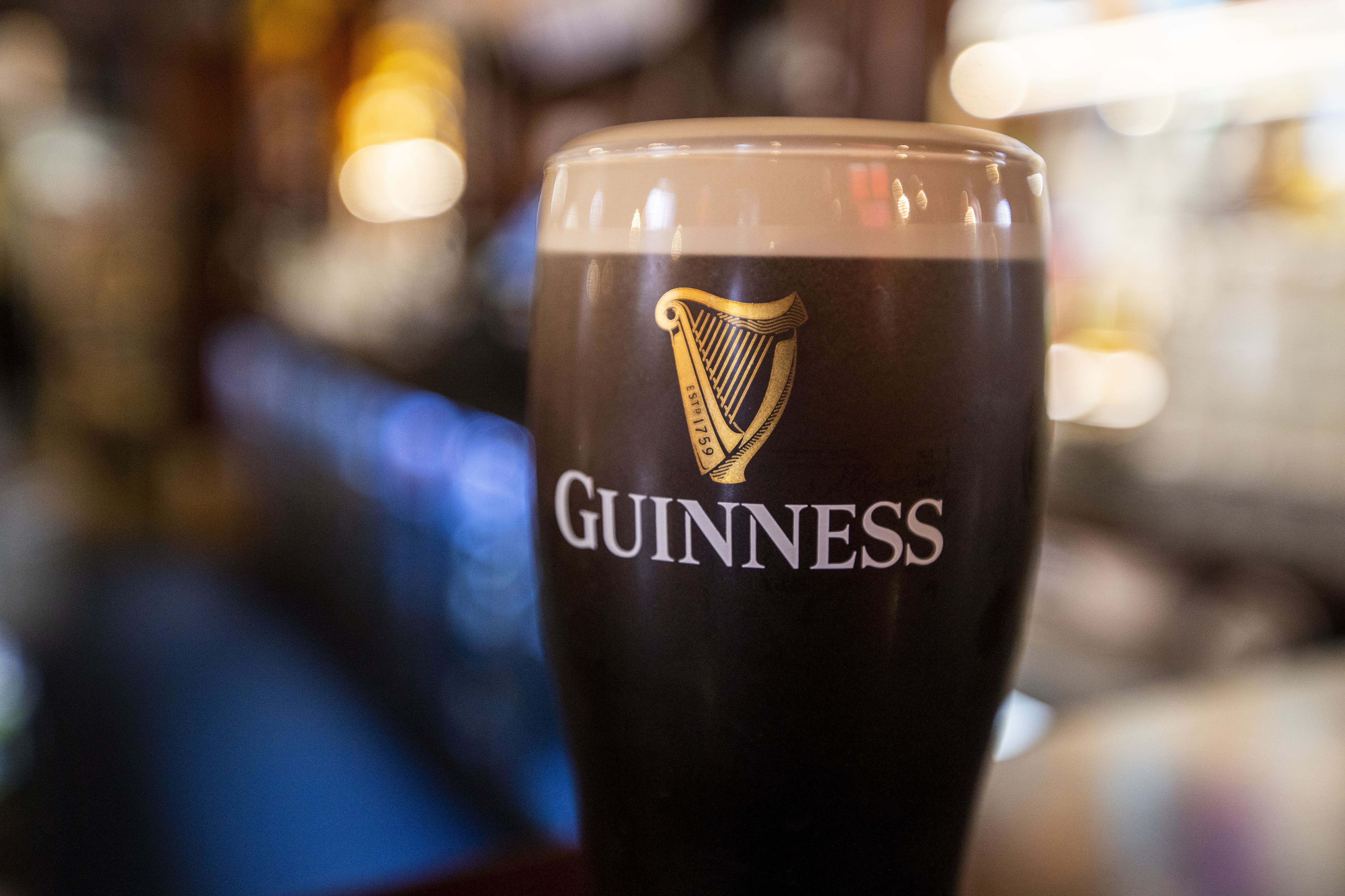 Guinness maker Diageo has reported a slump in profits and accelerated cost saving plans (Liam McBurney/PA)