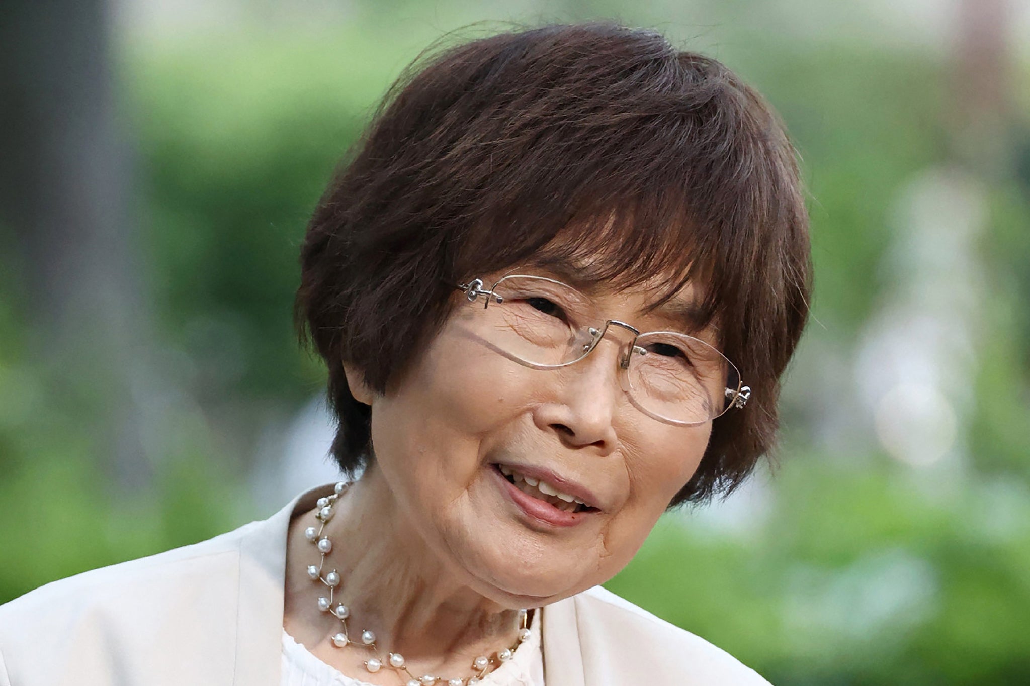 Keiko Ogura, a survivor of the atomic bombing, speaks with reporters at the Peace Memorial Museum in Hiroshima