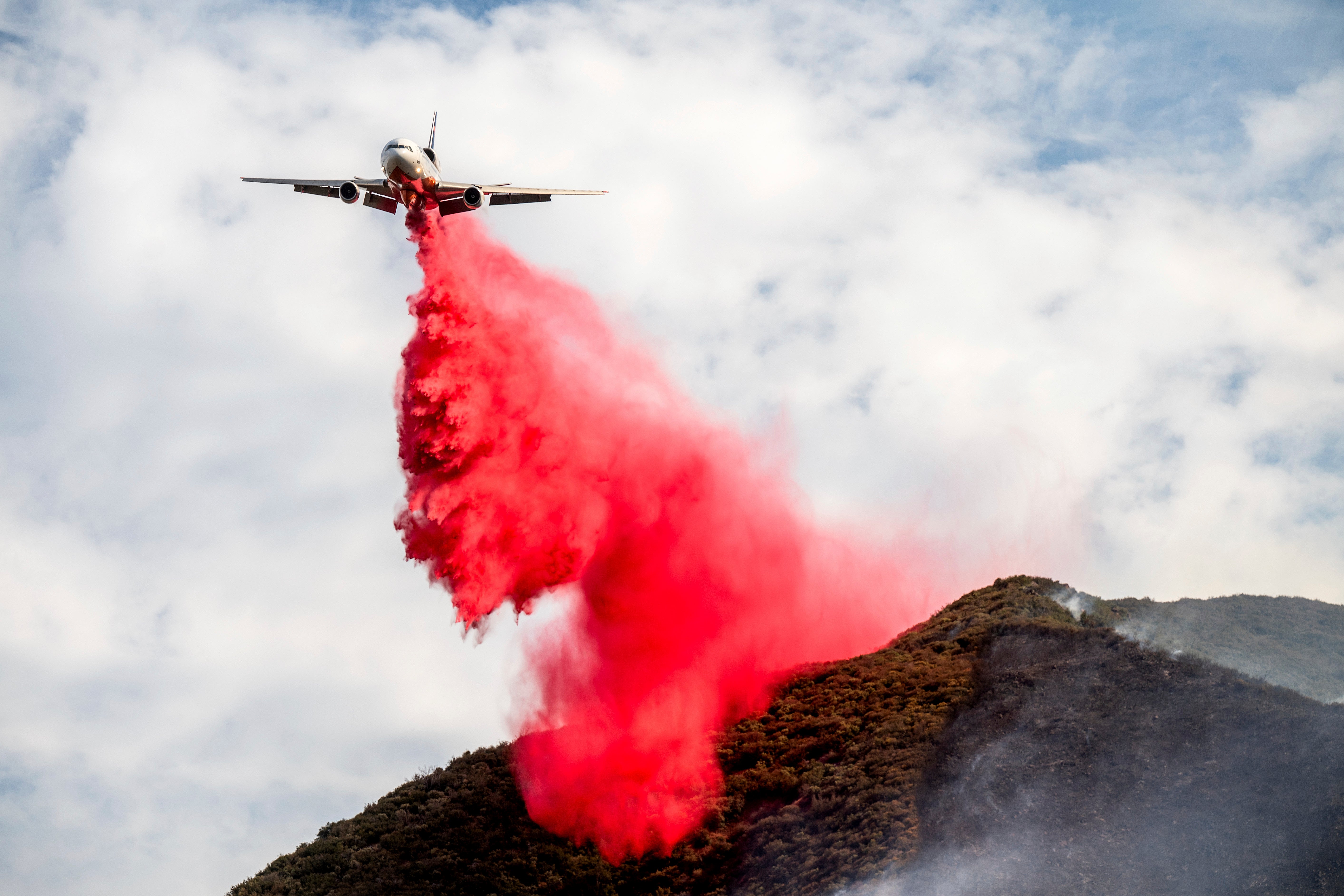 Massive central California wildfire keeps growing and becomes state's largest blaze of the year