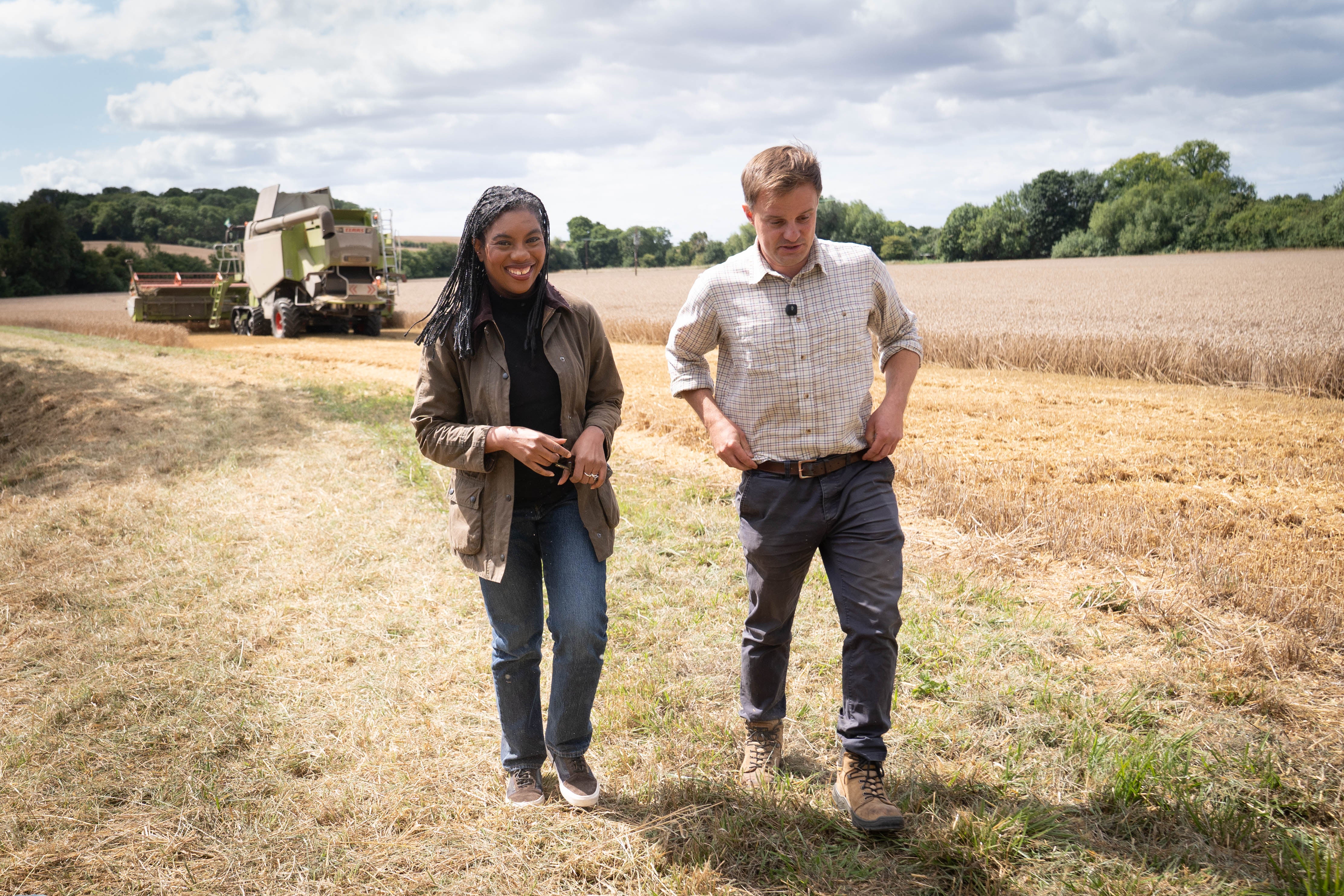 Kemi Badenoch speaks to farmer Sam Goddard during her visit to Hall Farm in Little Walden, Essex (Stefan Rousseau/PA)