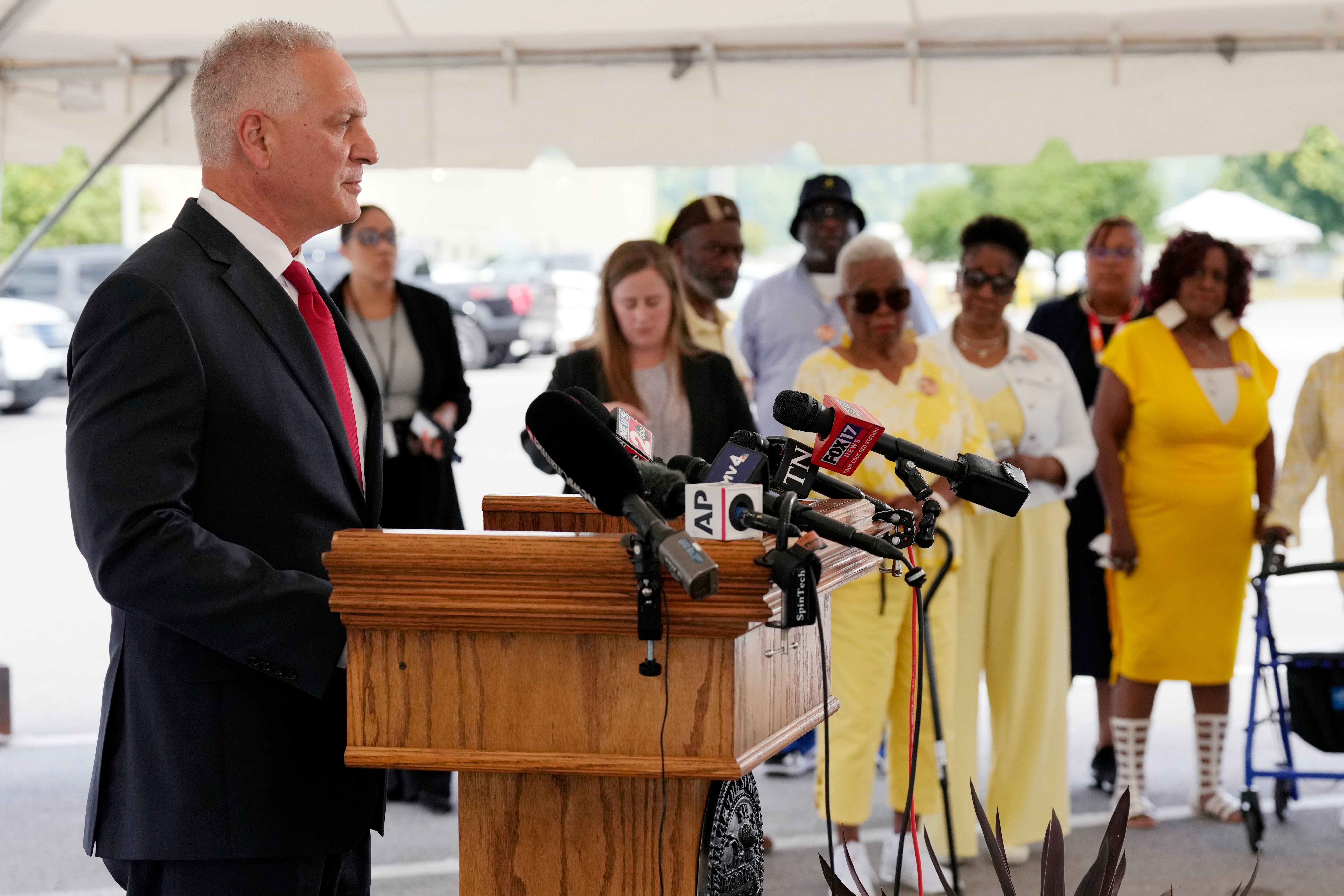 Tennessee Department of Correction Commissioner Frank Strada reads a statement as relatives of victims of convicted murderer Byron Black listen outside Riverbend Maximum Security Institution after his execution