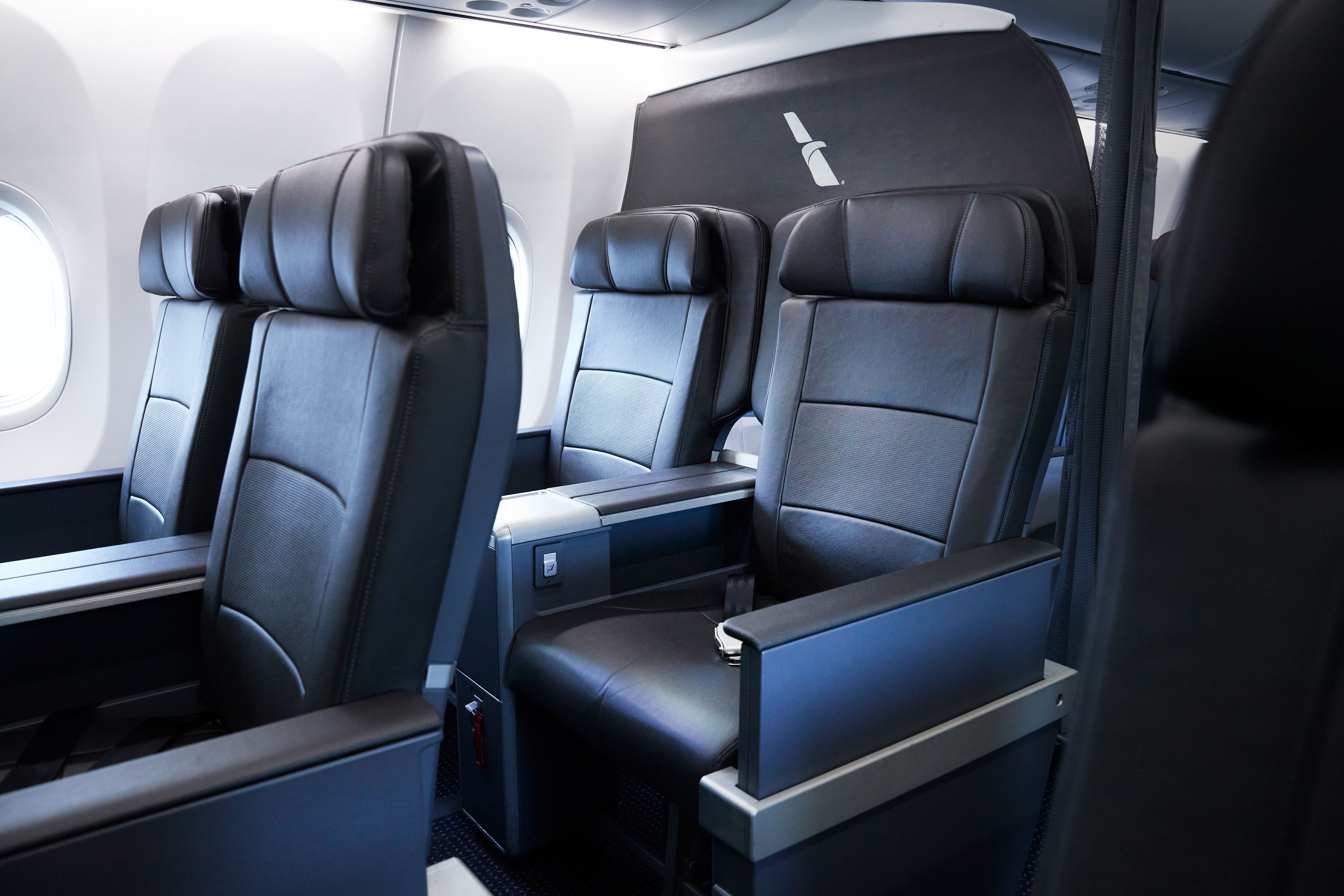 This image shows the old AA premium economy cabin