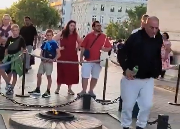 The man was seen walking away having lit up his cigarette