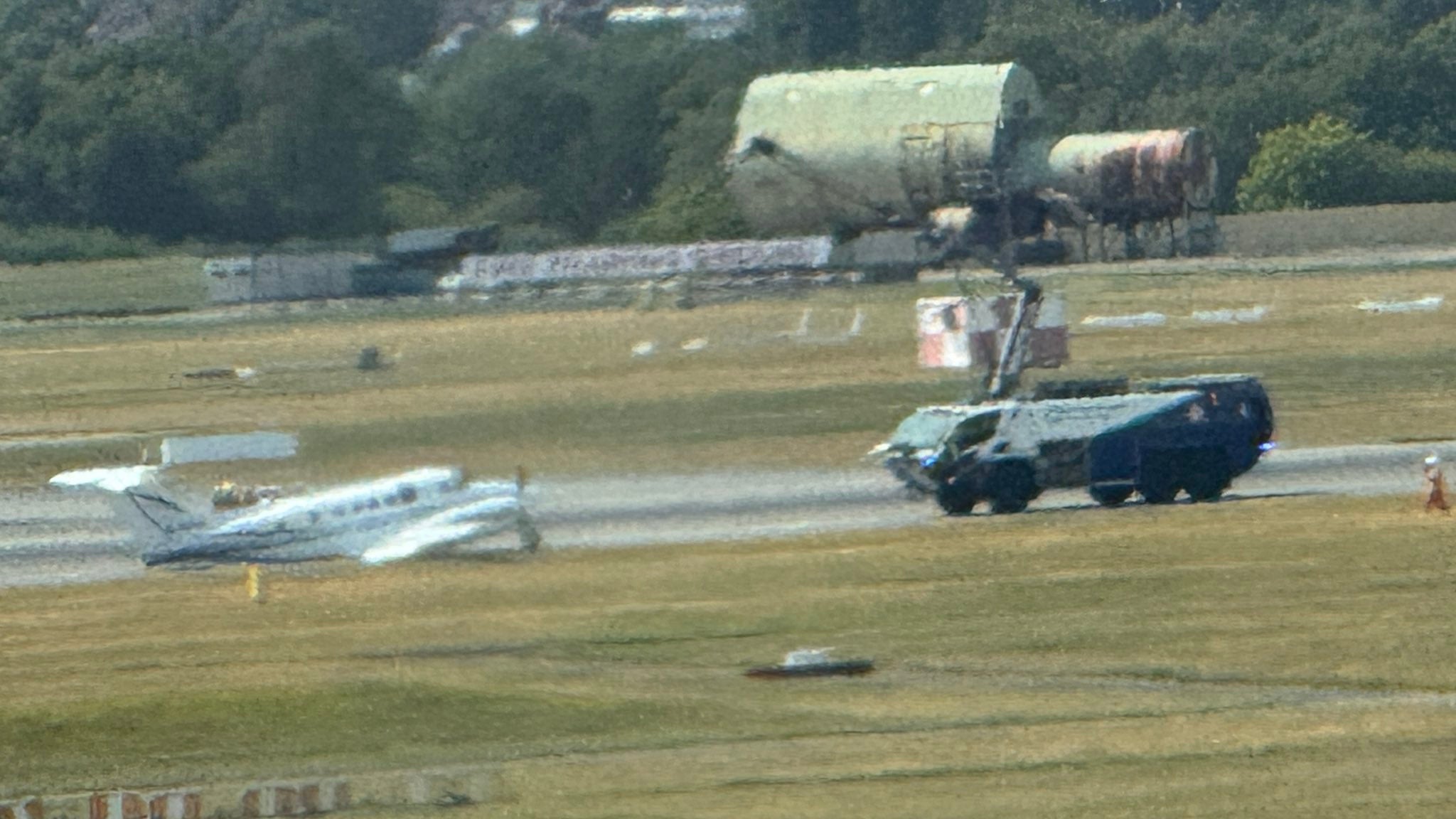 Birmingham Airport has temporarily closed its runway with all flights currently grounded after a small aircraft made an emergency landing