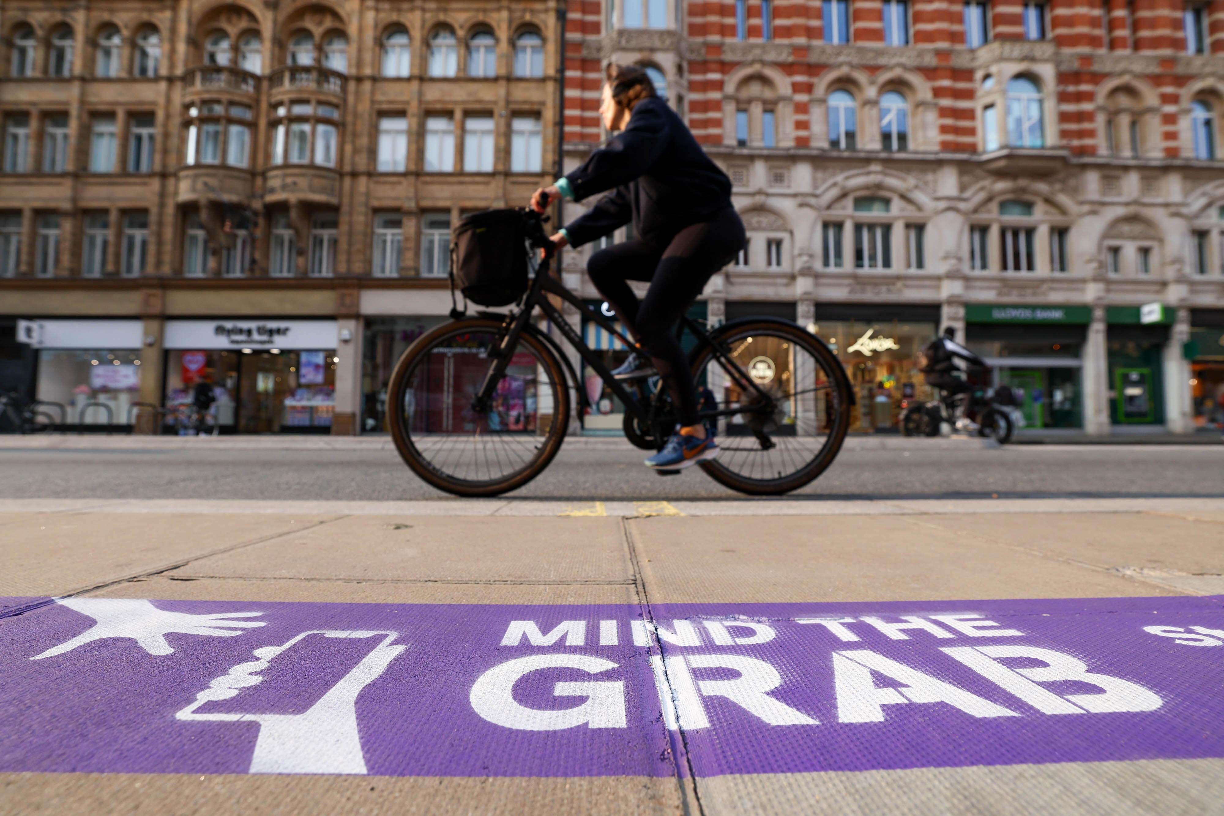 The purple line outside Currys in London’s Oxford Street in London is part of the retailer’s ‘Mind the Grab’ campaign (Kieran Cleeves Media Assignments/PA)