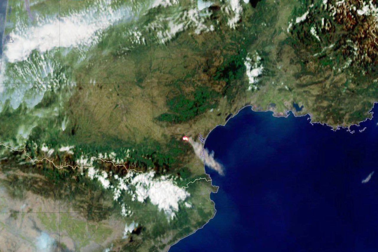 This photo provided by Meteo France shows smoke billowing from a wild fire in southern France, Tuesday, Aug. 5, 2025