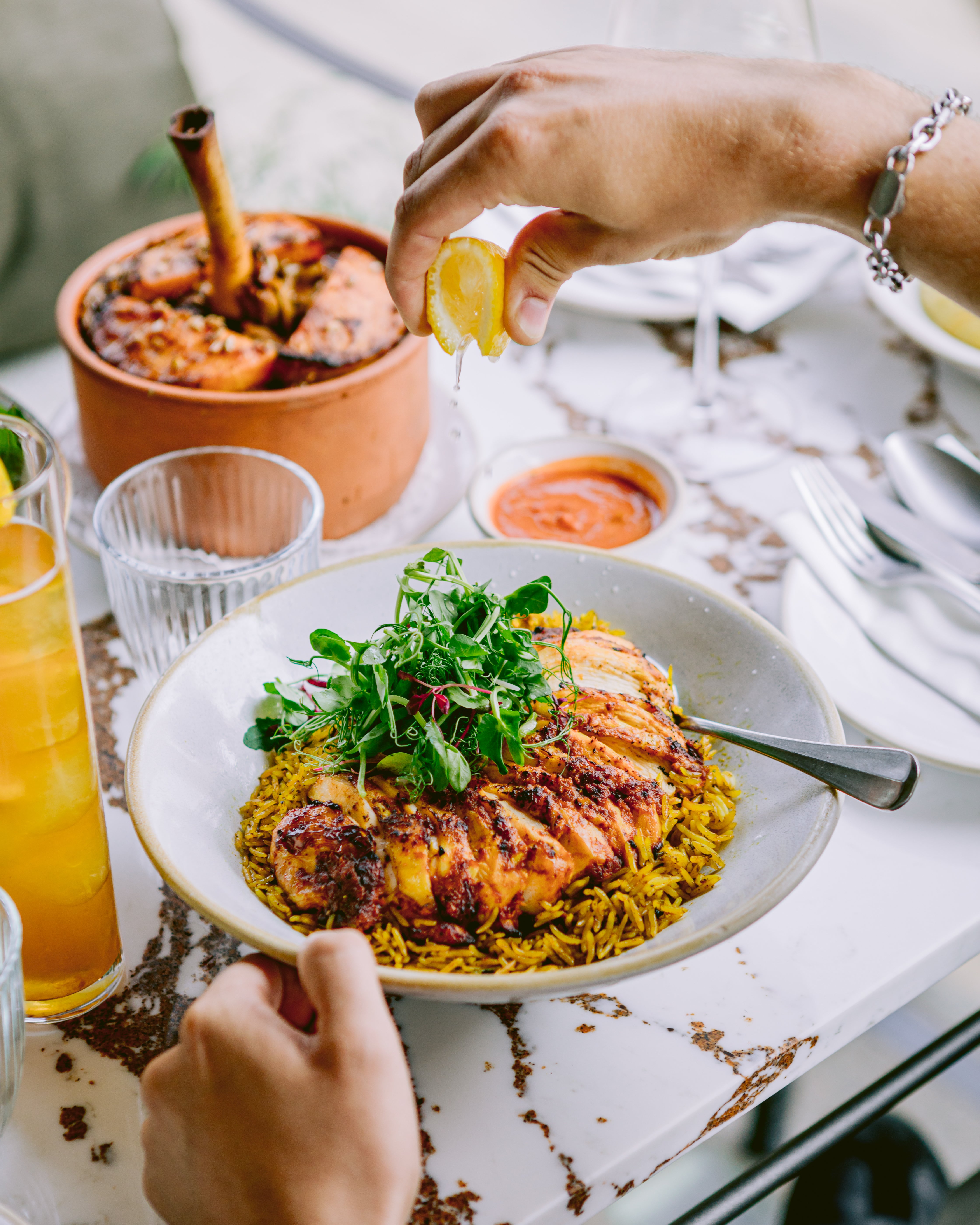 Fragrant with dried lime, cinnamon and cardamom, this one-pot chicken and rice dish is Bahrain’s national treasure