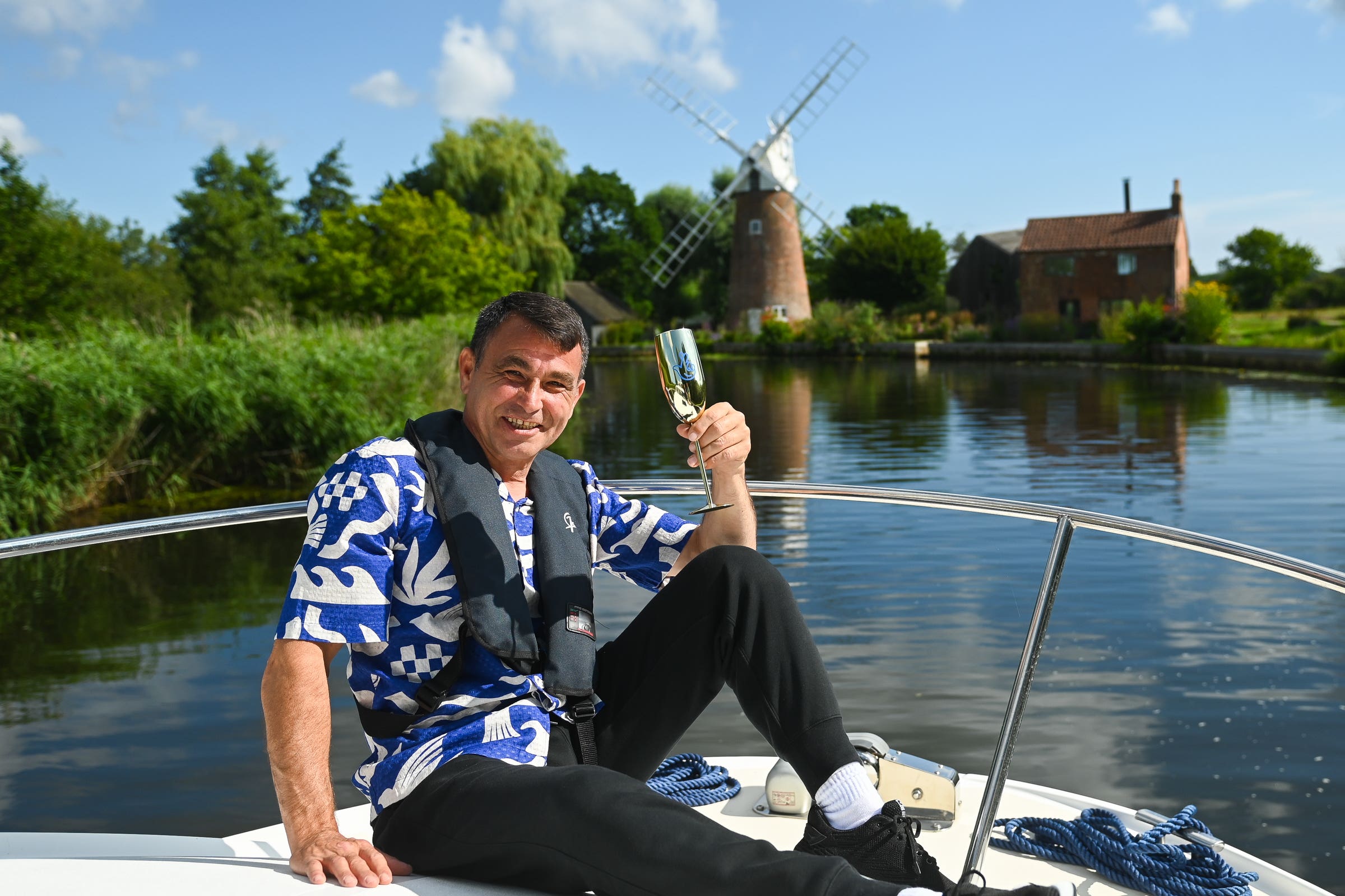 Paul Harvey celebrates his £1 million lottery win (National Lottery/ PA)