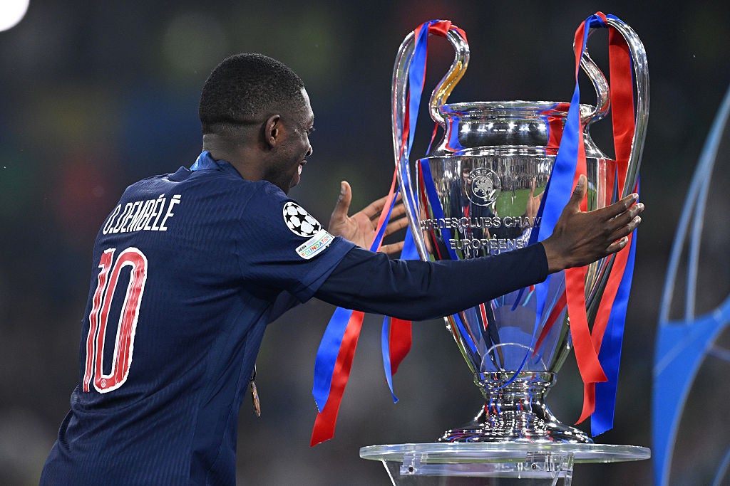 Ousmane Dembele with the UCL trophy